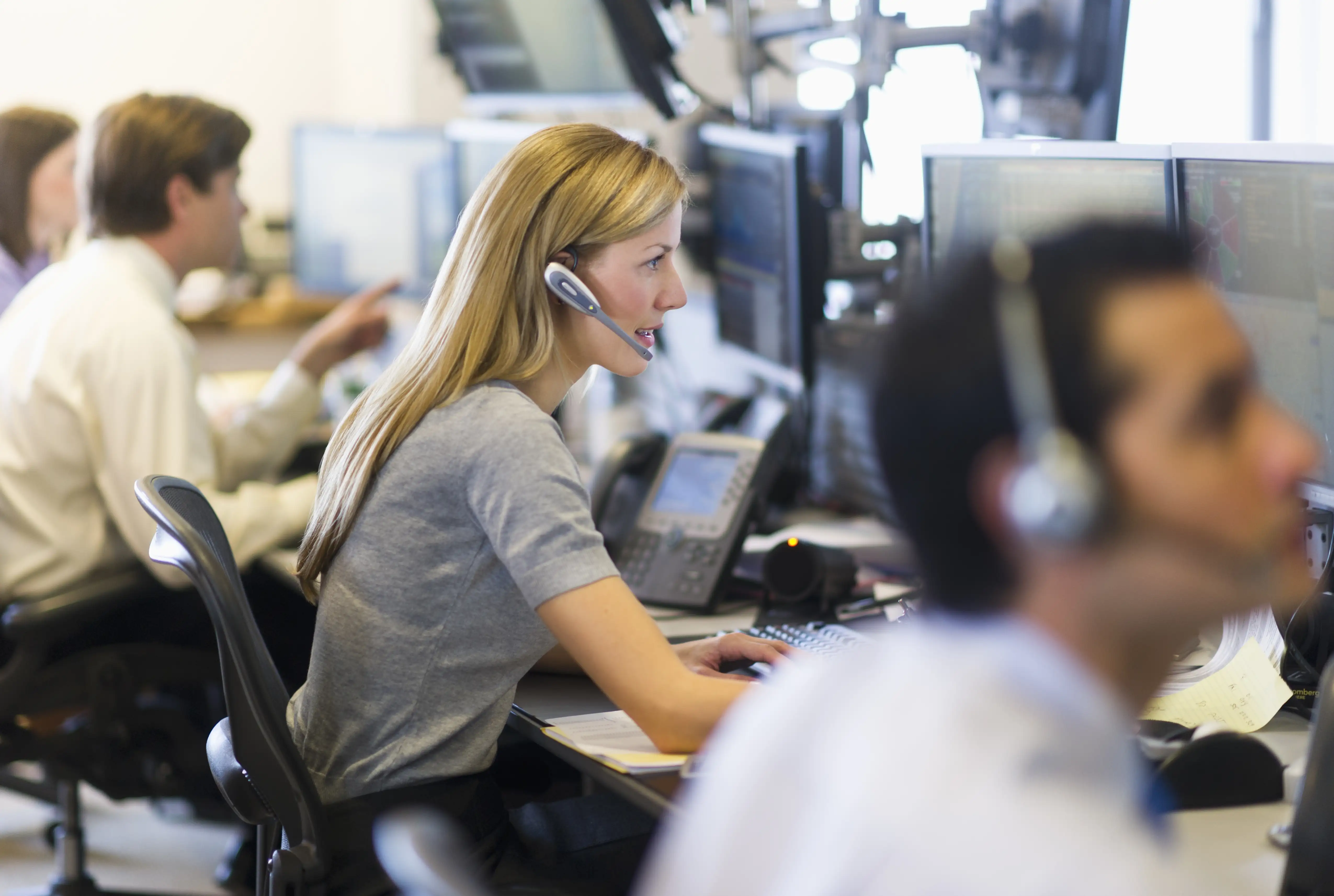 Woman at a trading desk