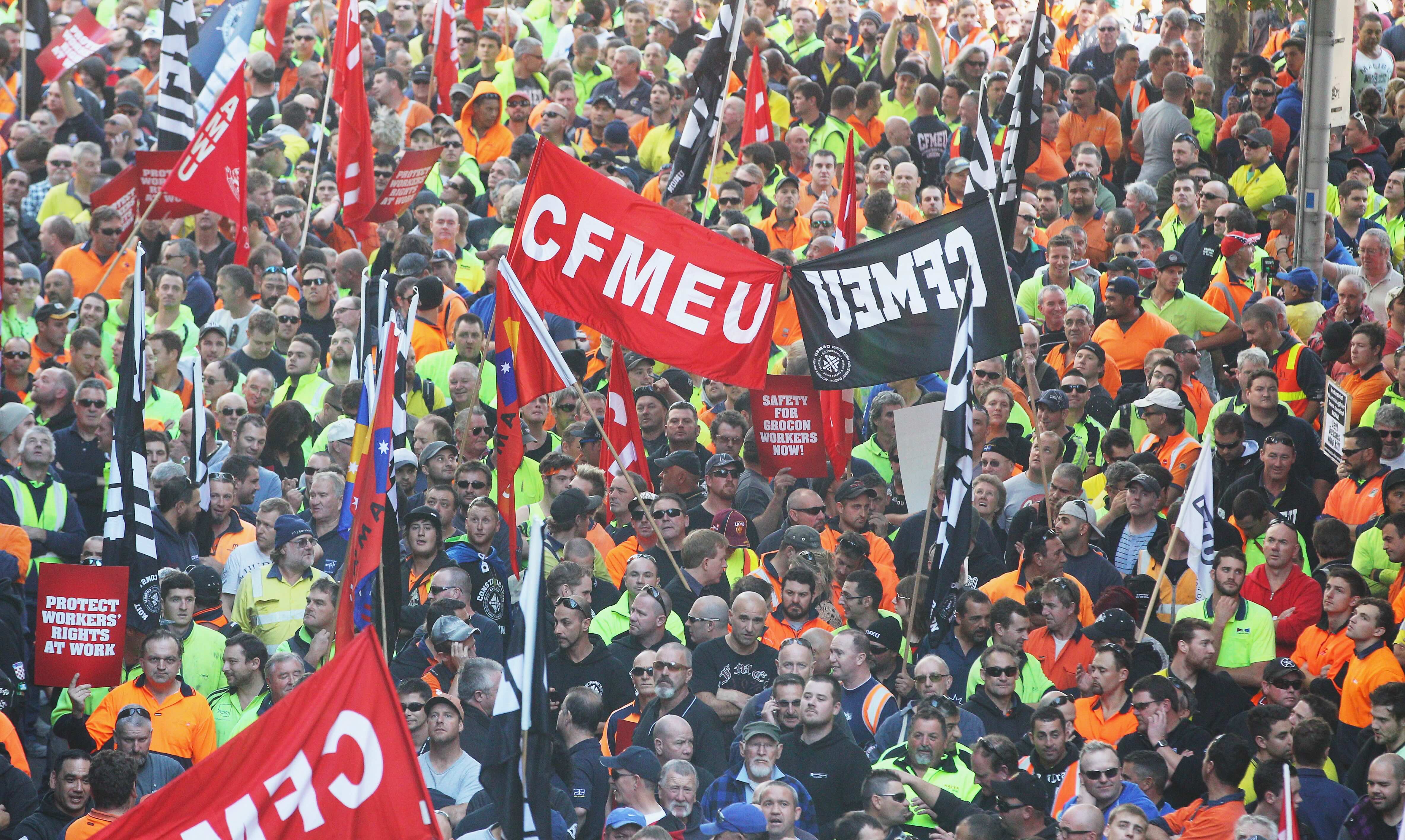 Construction workers march in protest about working conditions in 2013