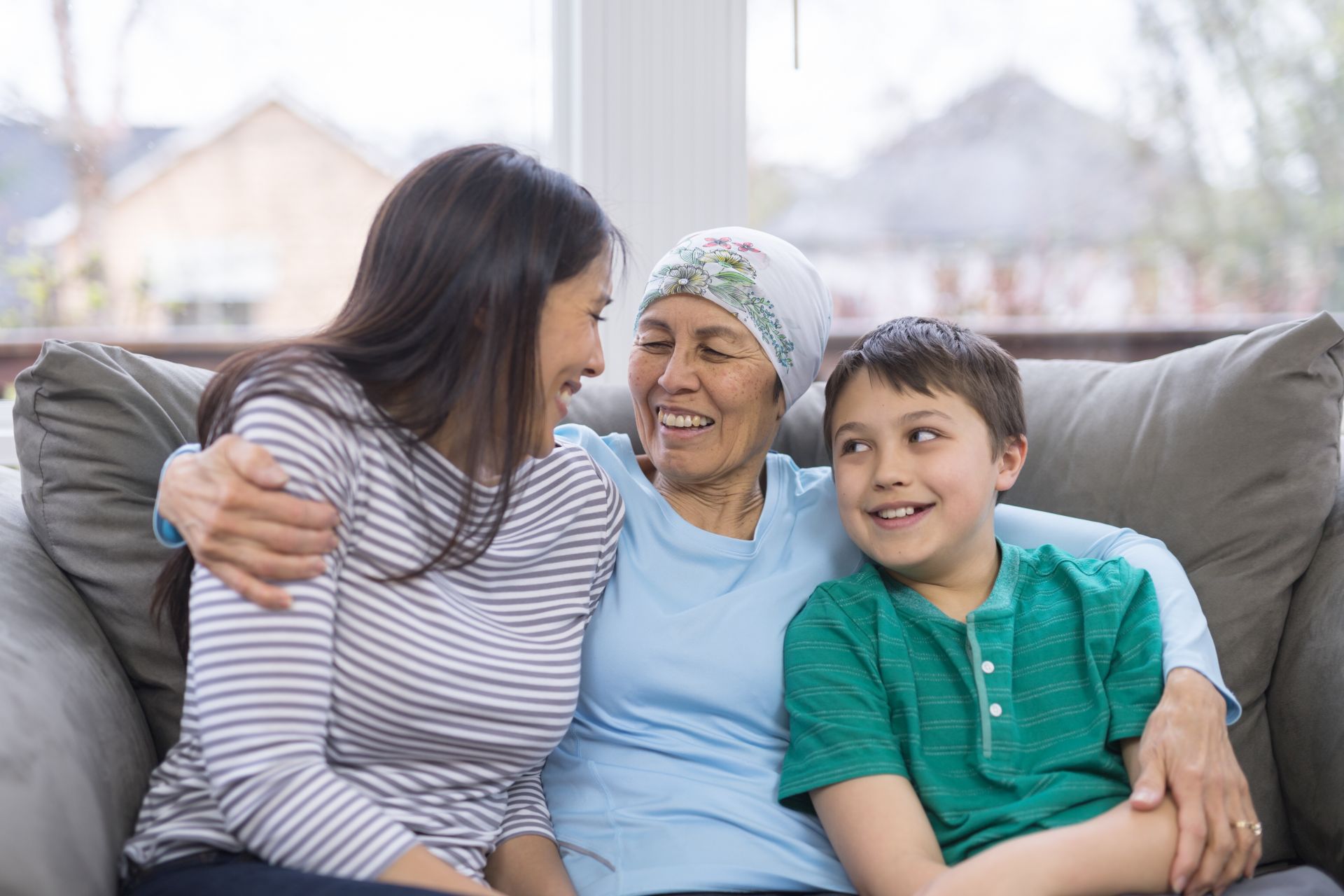 Woman in head scarf with family