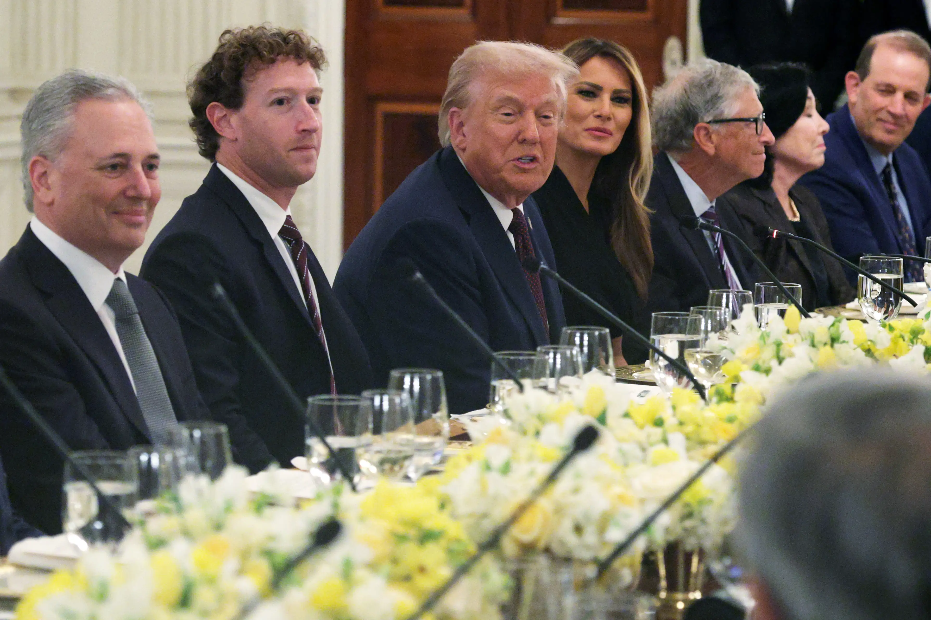US President Donald Trump speaks with ‘AI and Crypto Czar’ David Scahs, Meta CEO Mark Zuckerberg, first lady Melania Trump and Bill Gates.