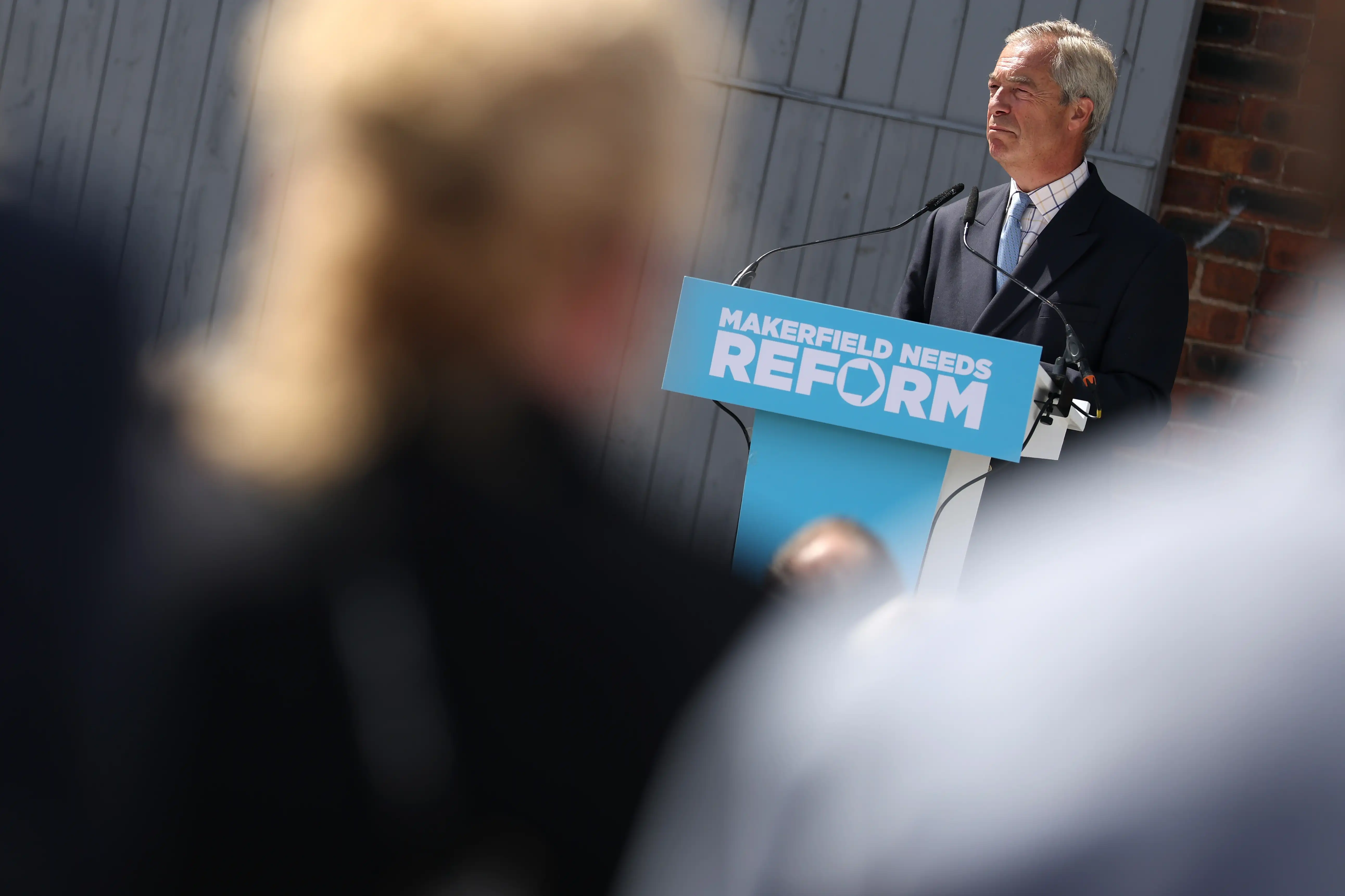 Reform UK Leader Nigel Farage speaks at a press conference ahead of the Makerfield by-election in June
