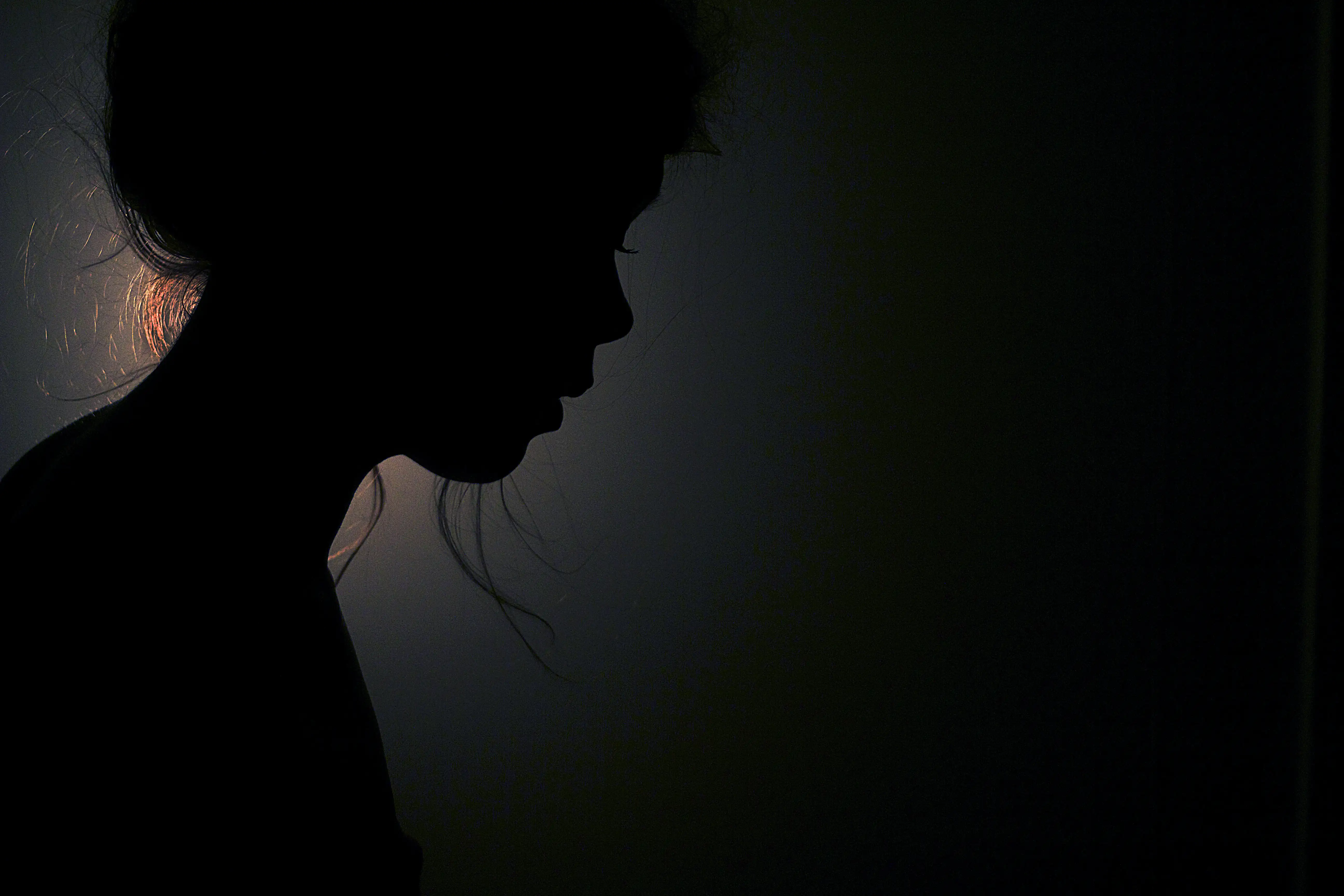 A silhouette of a woman