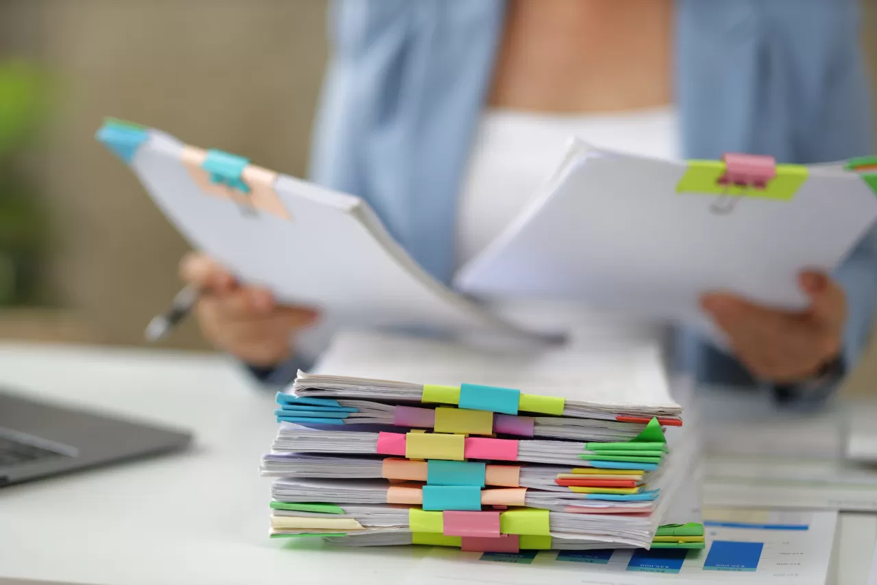 Woman sorting through files