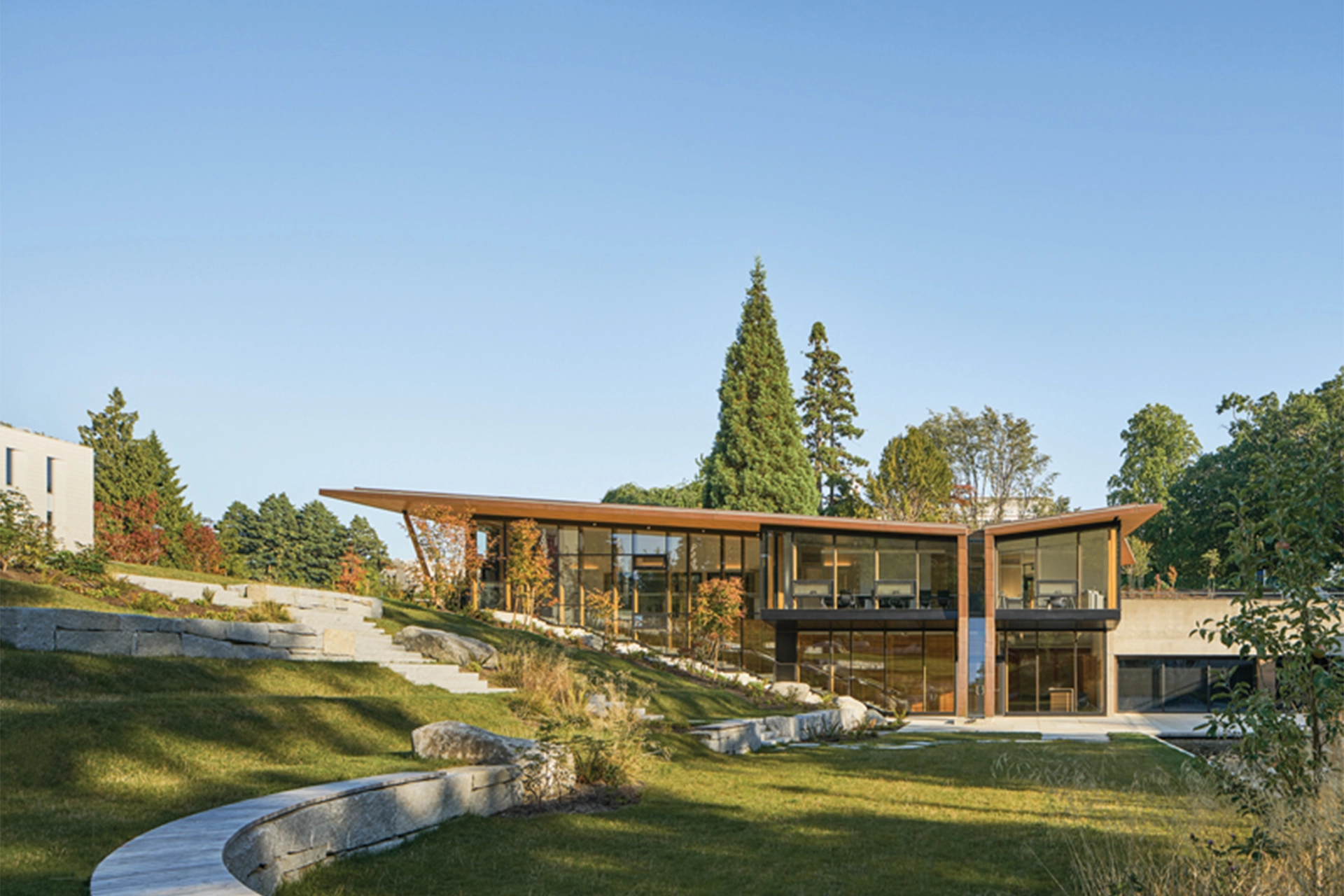 A wooden building built into the side of a hill