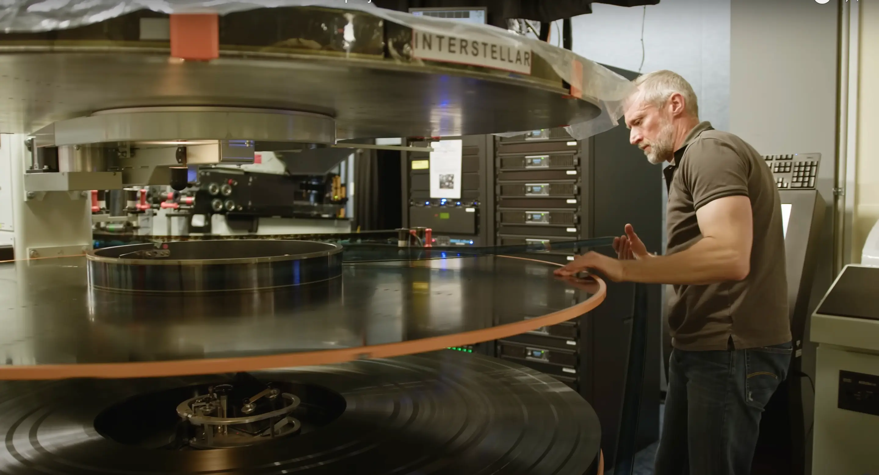 A very large film reel of 70mm film with the title 'Interstellar' written on the side. 