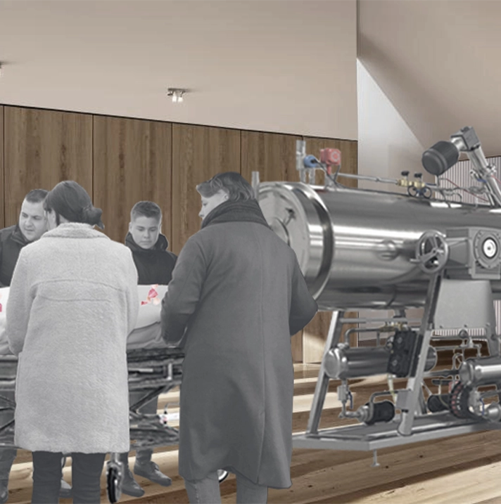 People standing around a body about to go in an aquamation tank