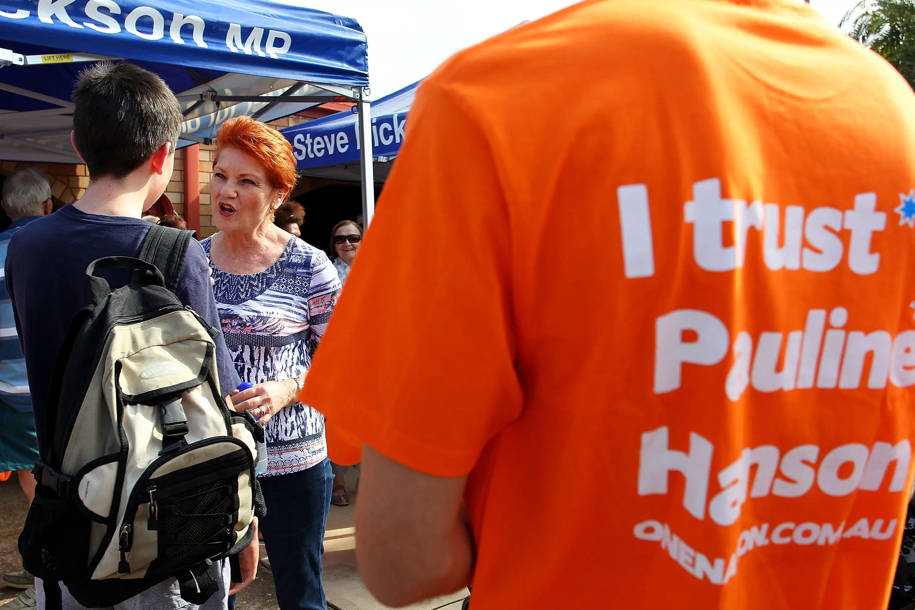 One Nation Senator Pauline Hanson meets a local supporter wearing an ‘I trust Pauline shirt’