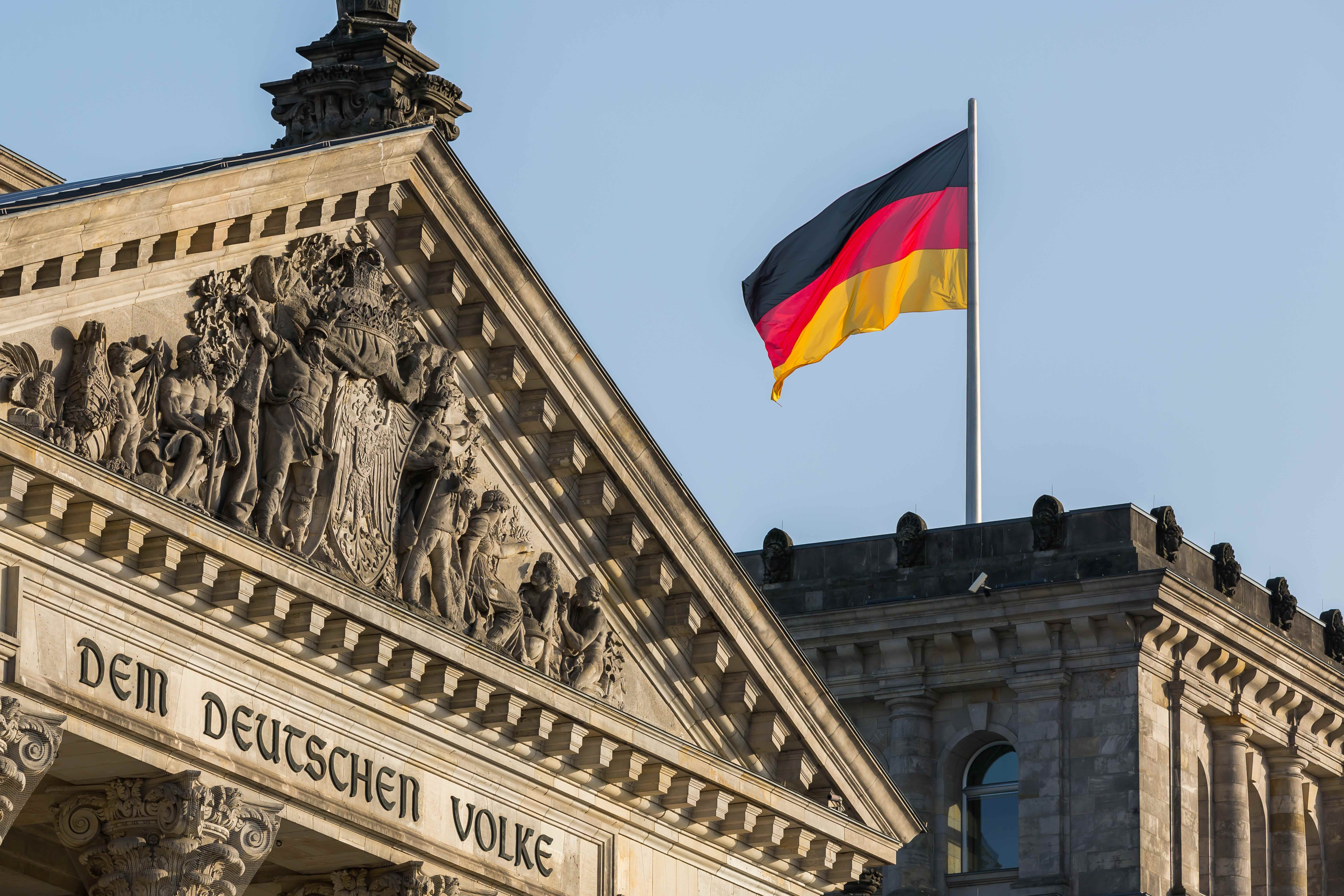 German flag and Reichstag building