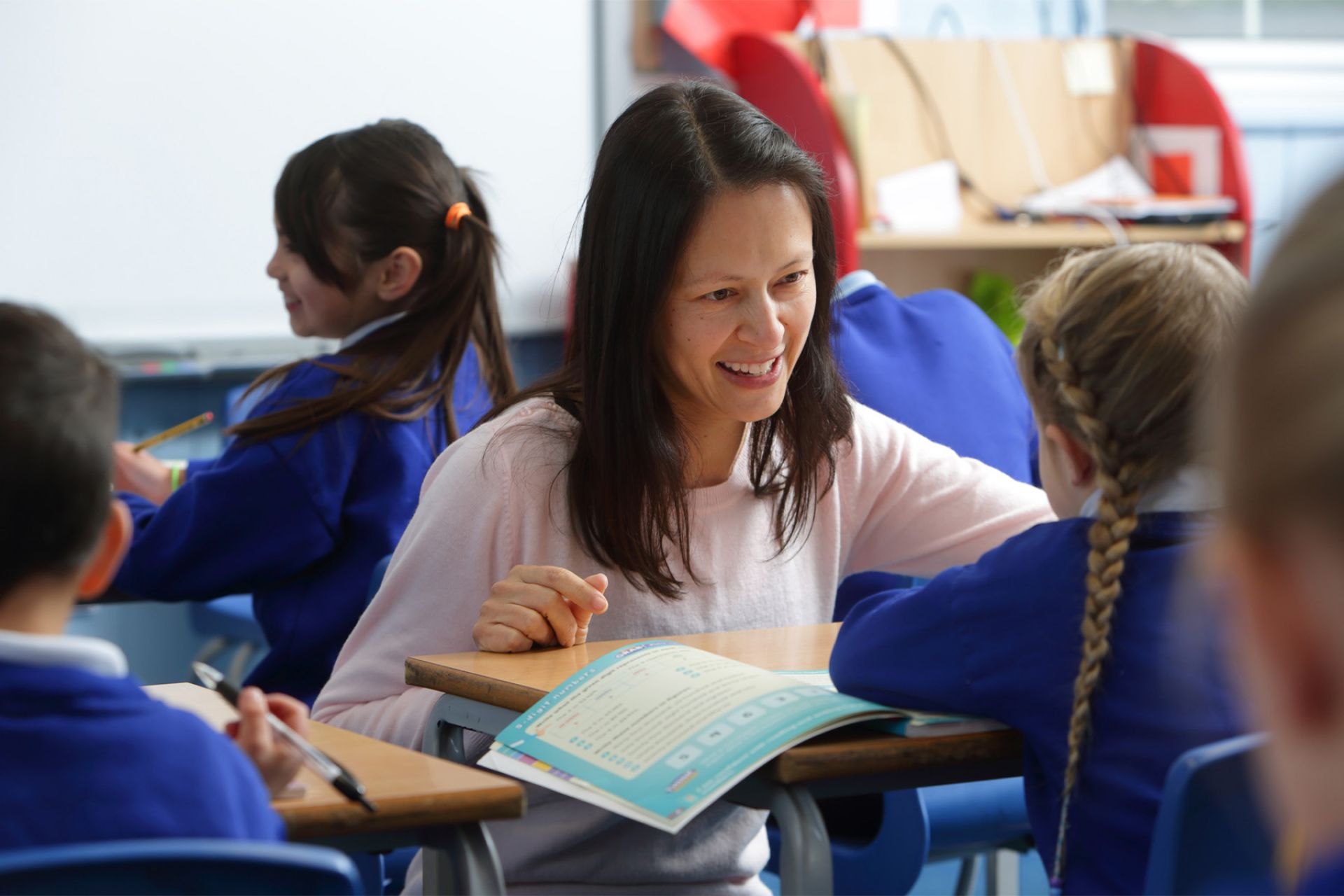 Teacher interacting with students