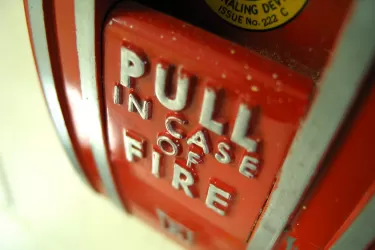 A lever labelled "pull in case of fire"