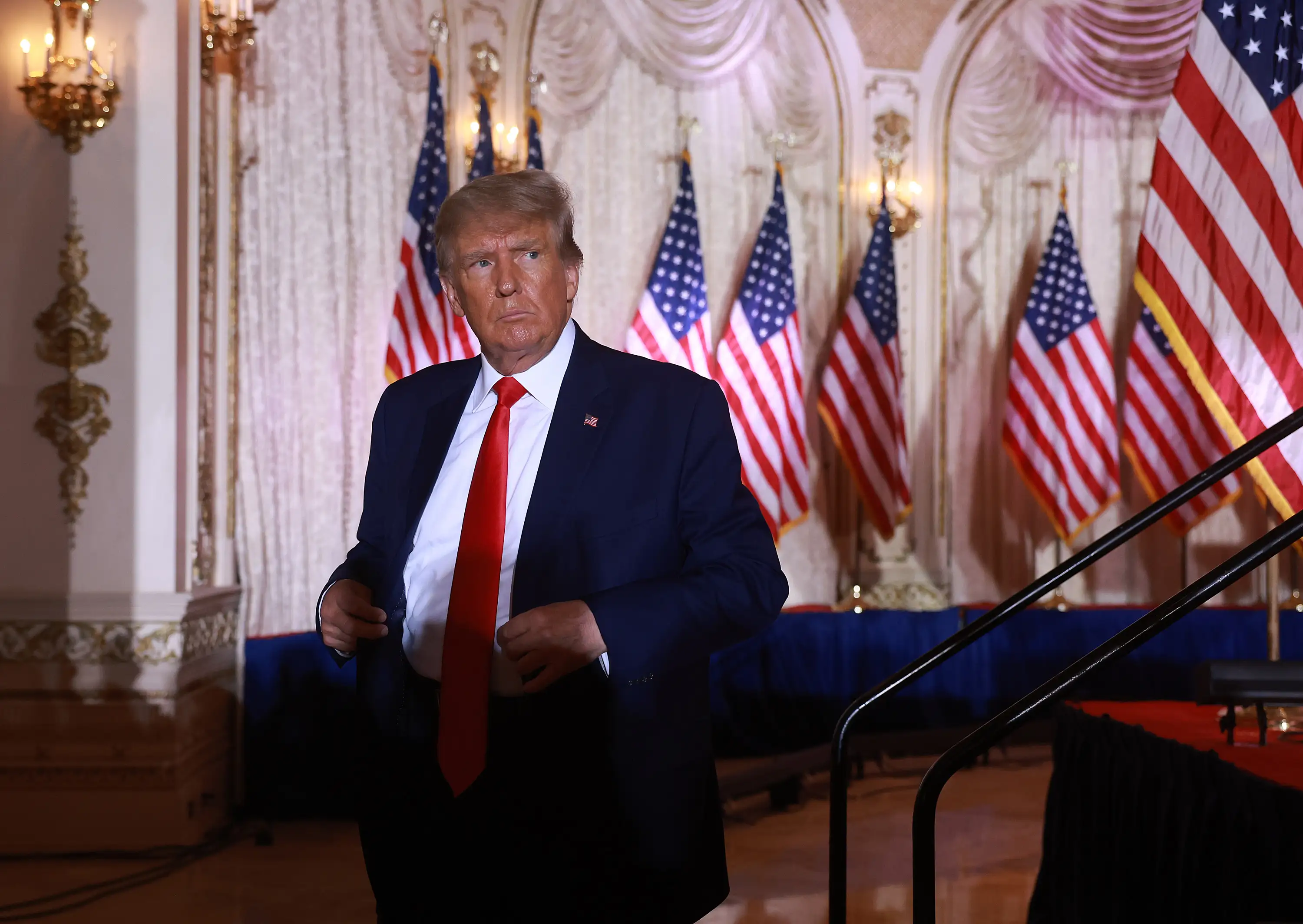 ormer U.S. President Donald Trump leaves the stage after speaking during an event at his Mar-a-Lago home.