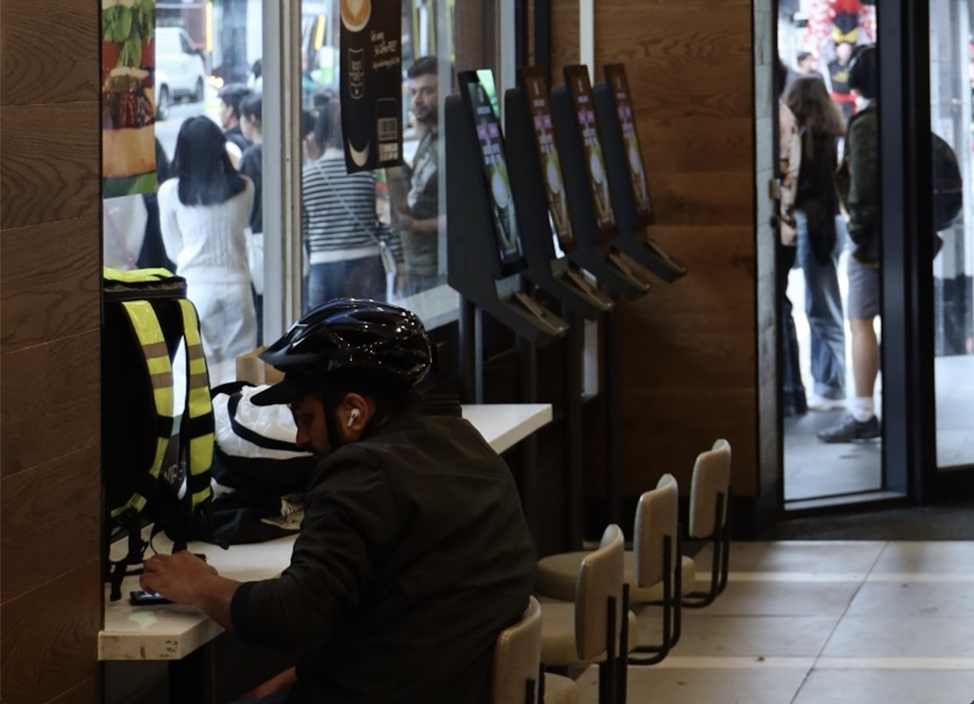 Gig worker inside Hungry Jacks