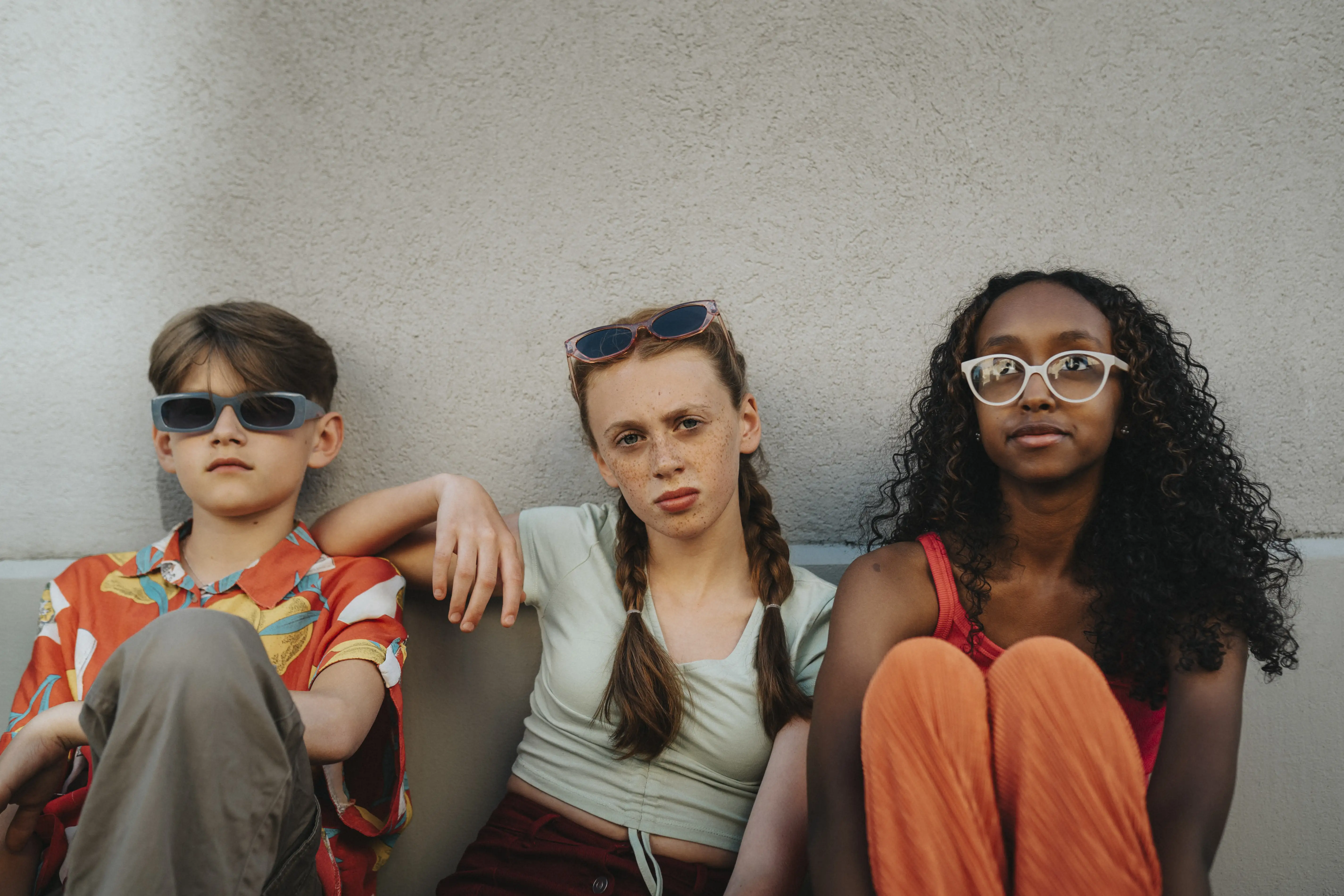 Three teenagers looking sassy at the camera