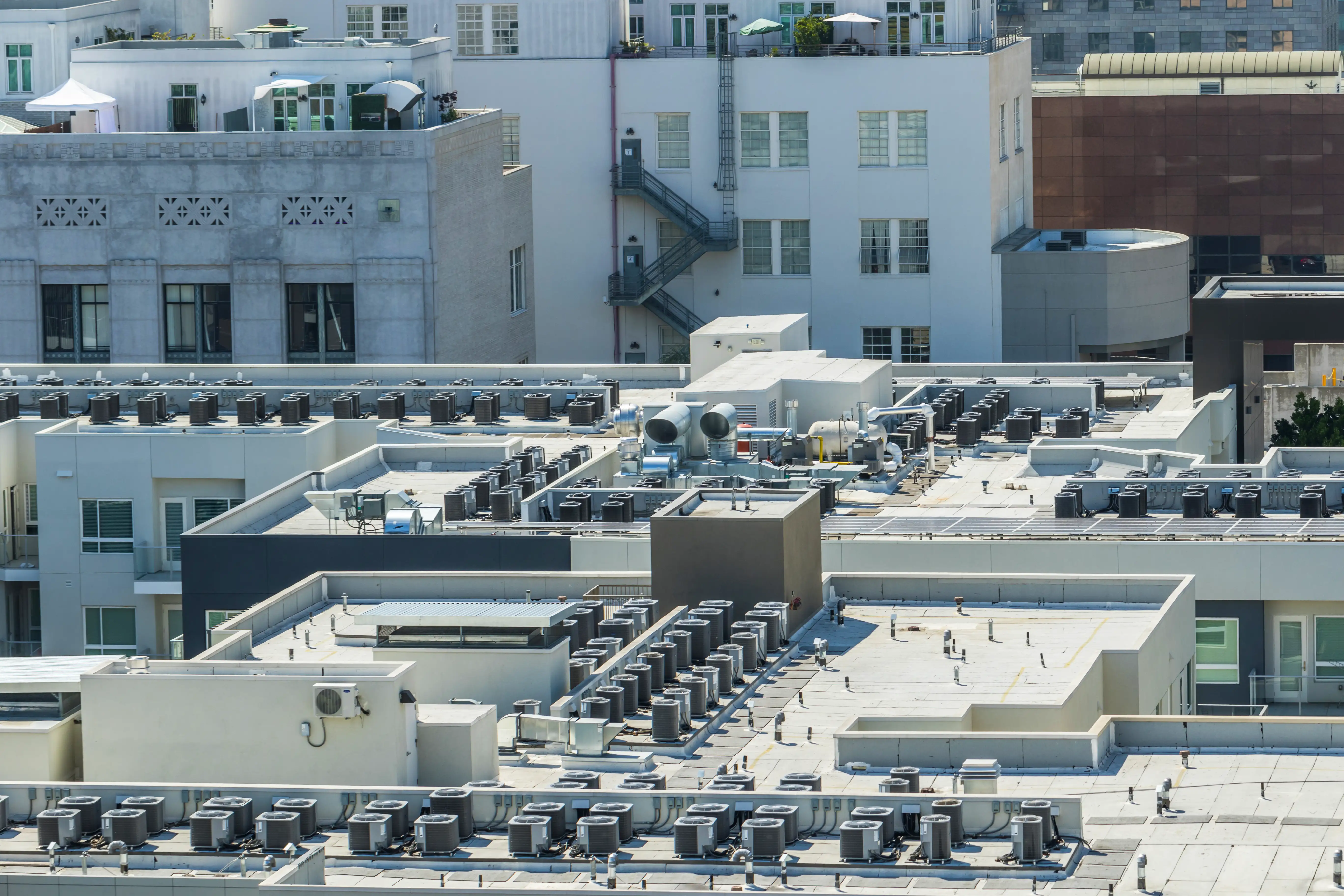 Air conditioning units on top of modern city building