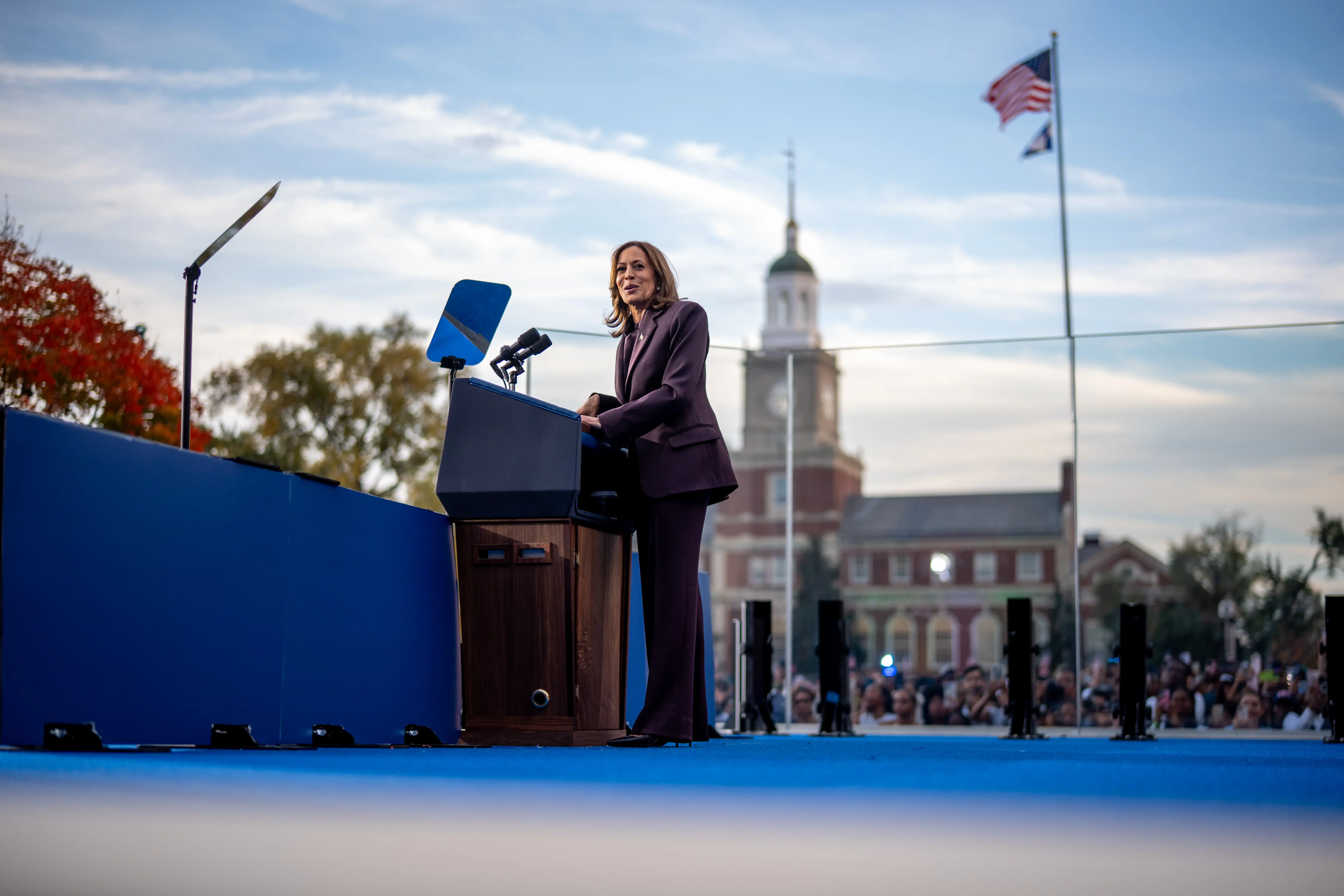 Kamala Harris speaks on stage as she concedes the election