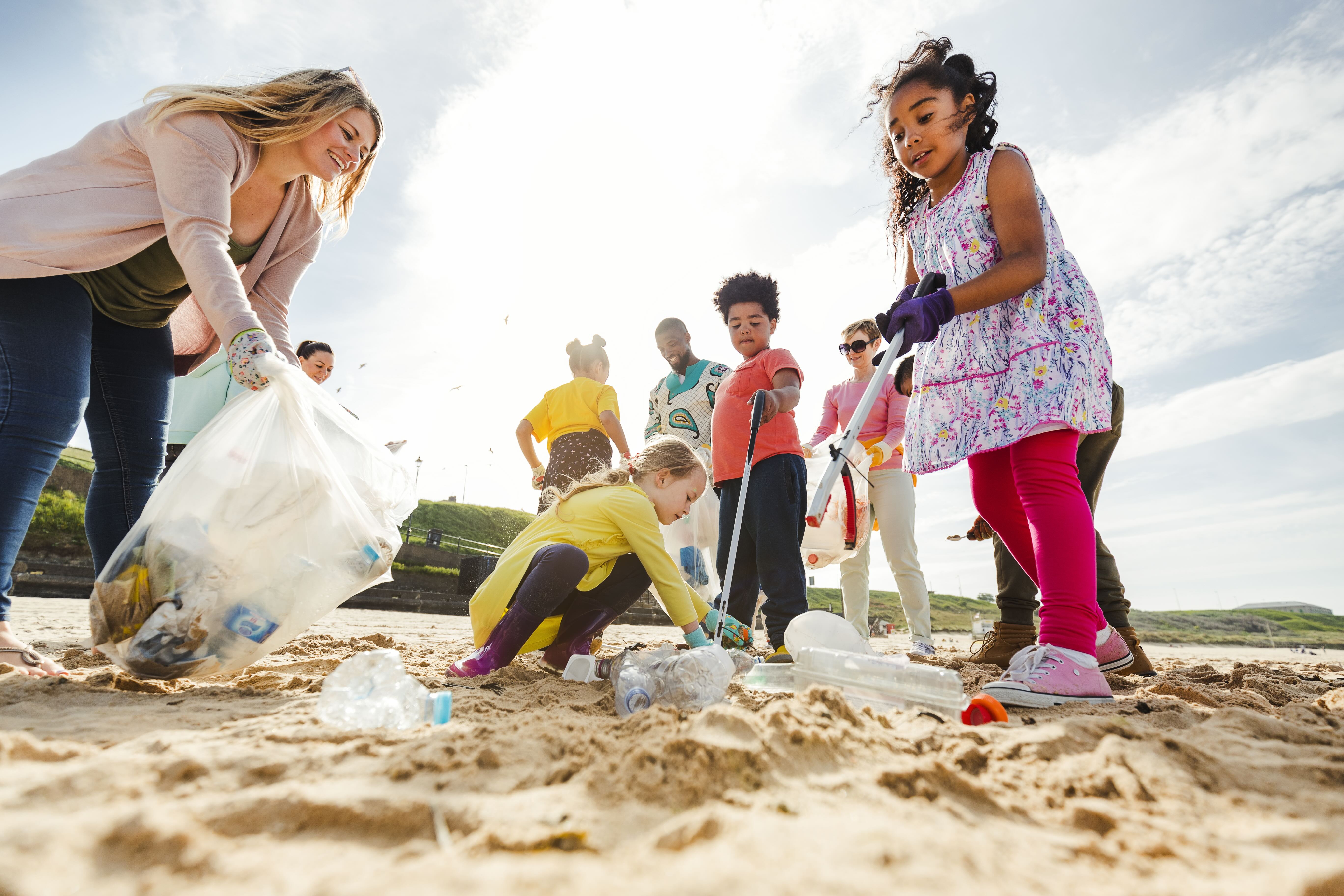 cleaning up rubbish on beach