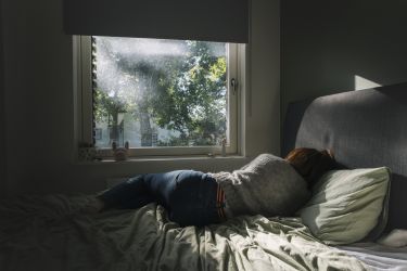 Stuck in bed looking out window