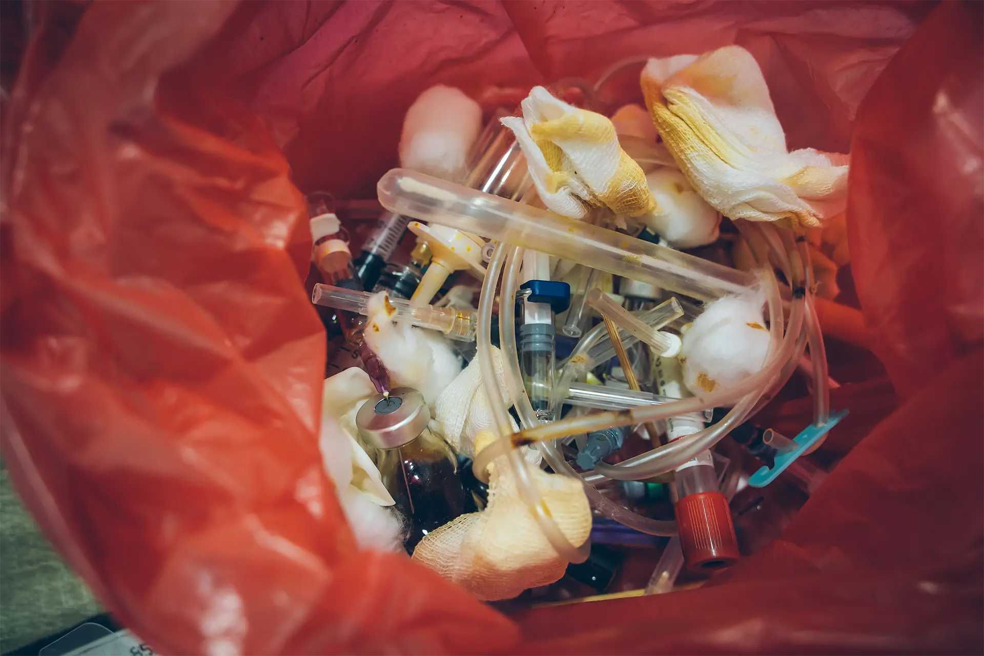 Various medical waste in a rubbish bin