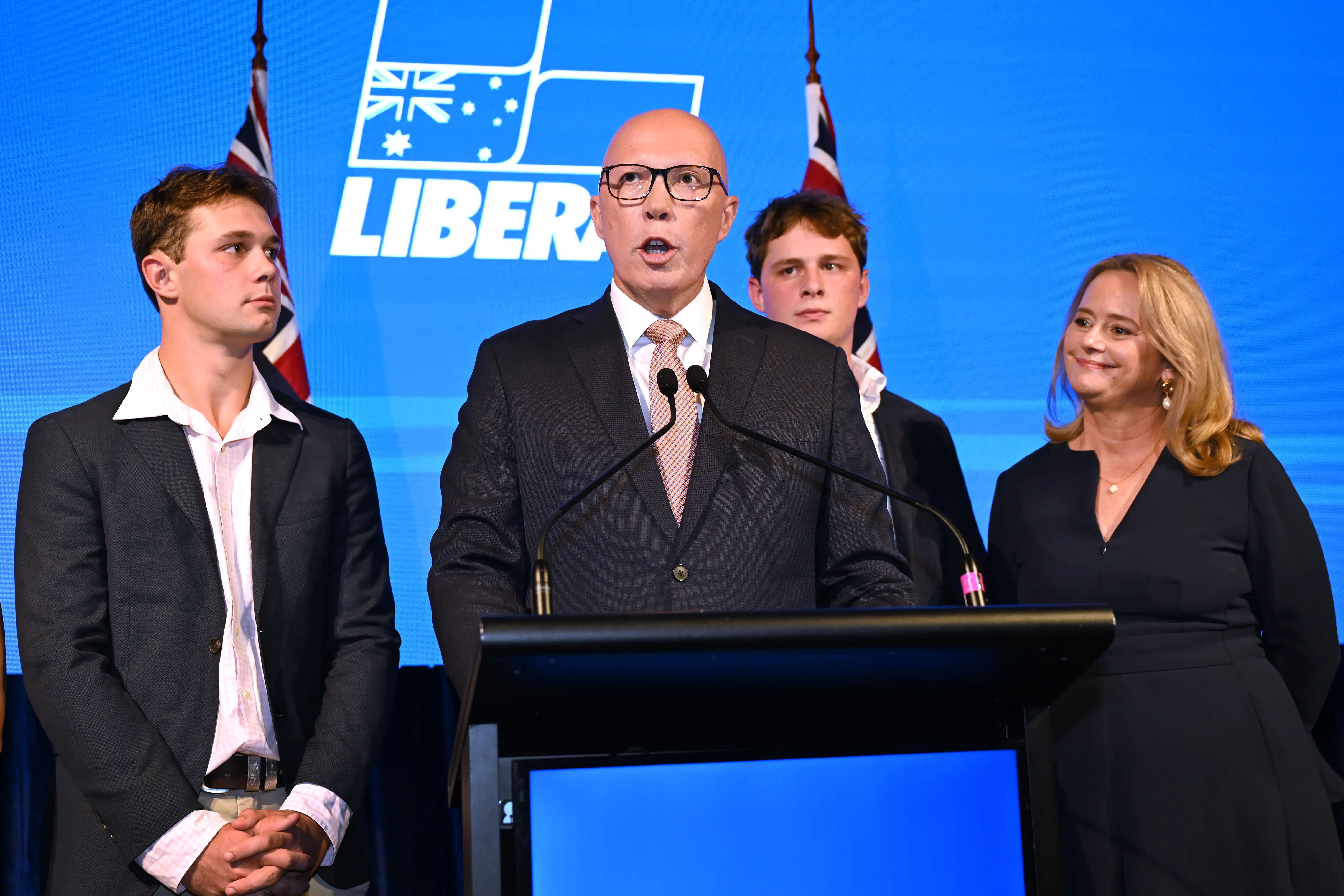 Opposition Leader Peter Dutton concedes defeat alongside wife Kirilly and their children Harry and Tom