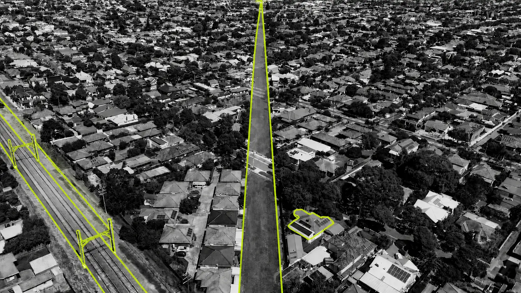 A black-and-white aerial photo of a 'green corridor' in Melbourne's north with elements picked out in lime green