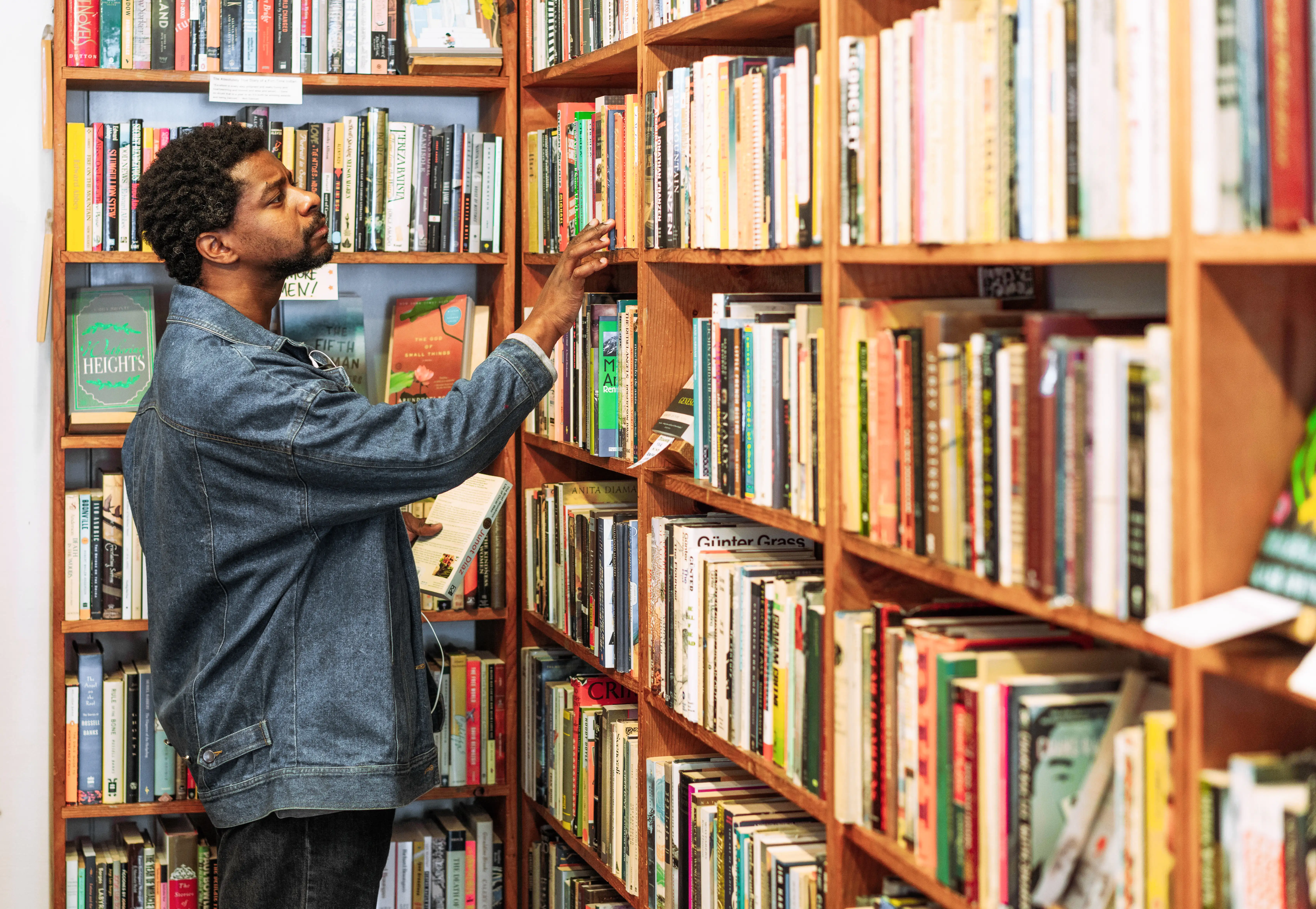 A man browsing books in a book shop