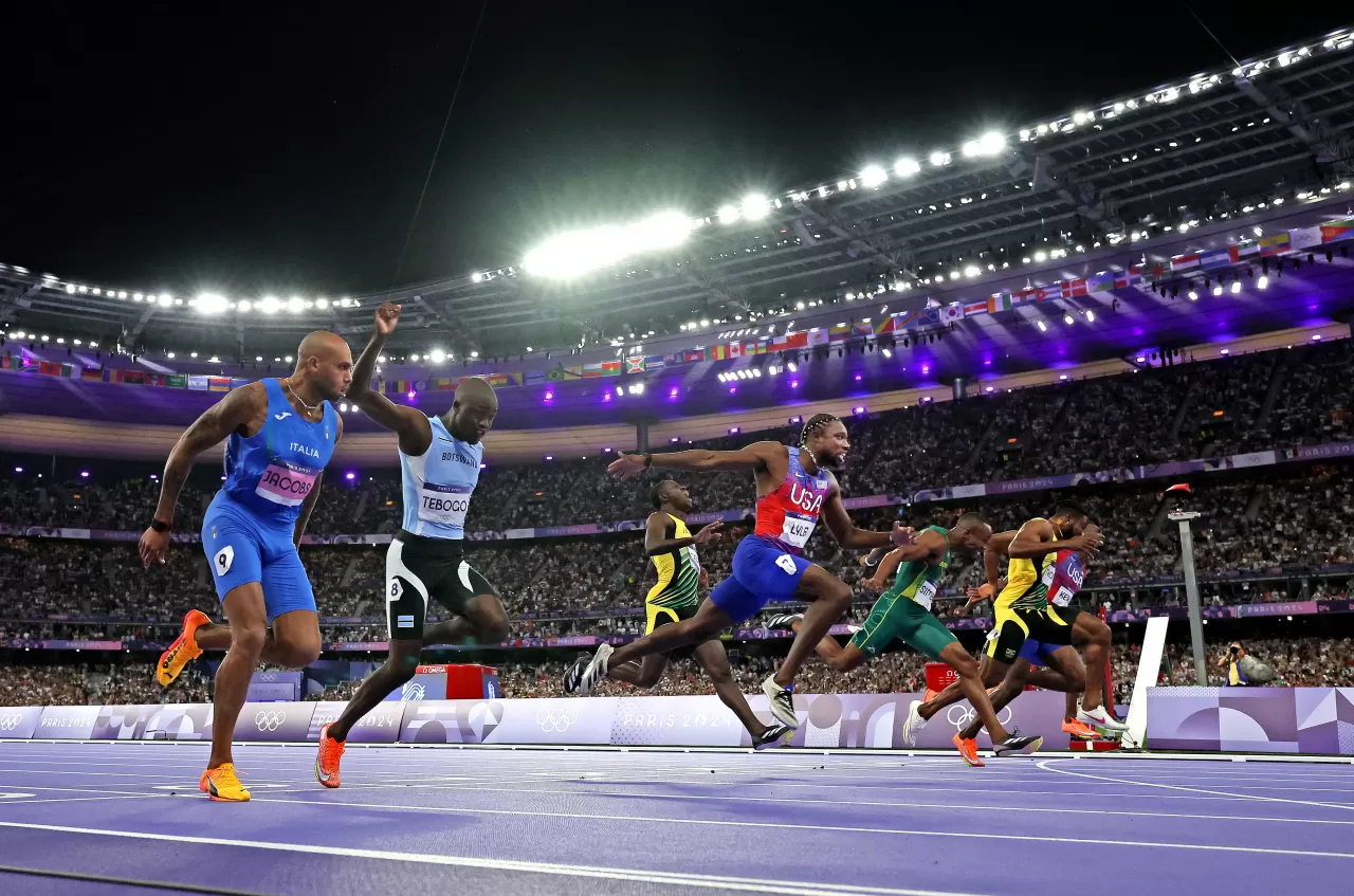 Noah Lyles of Team United States crosses the finish line to win the gold medal in the Men's 100m Final 