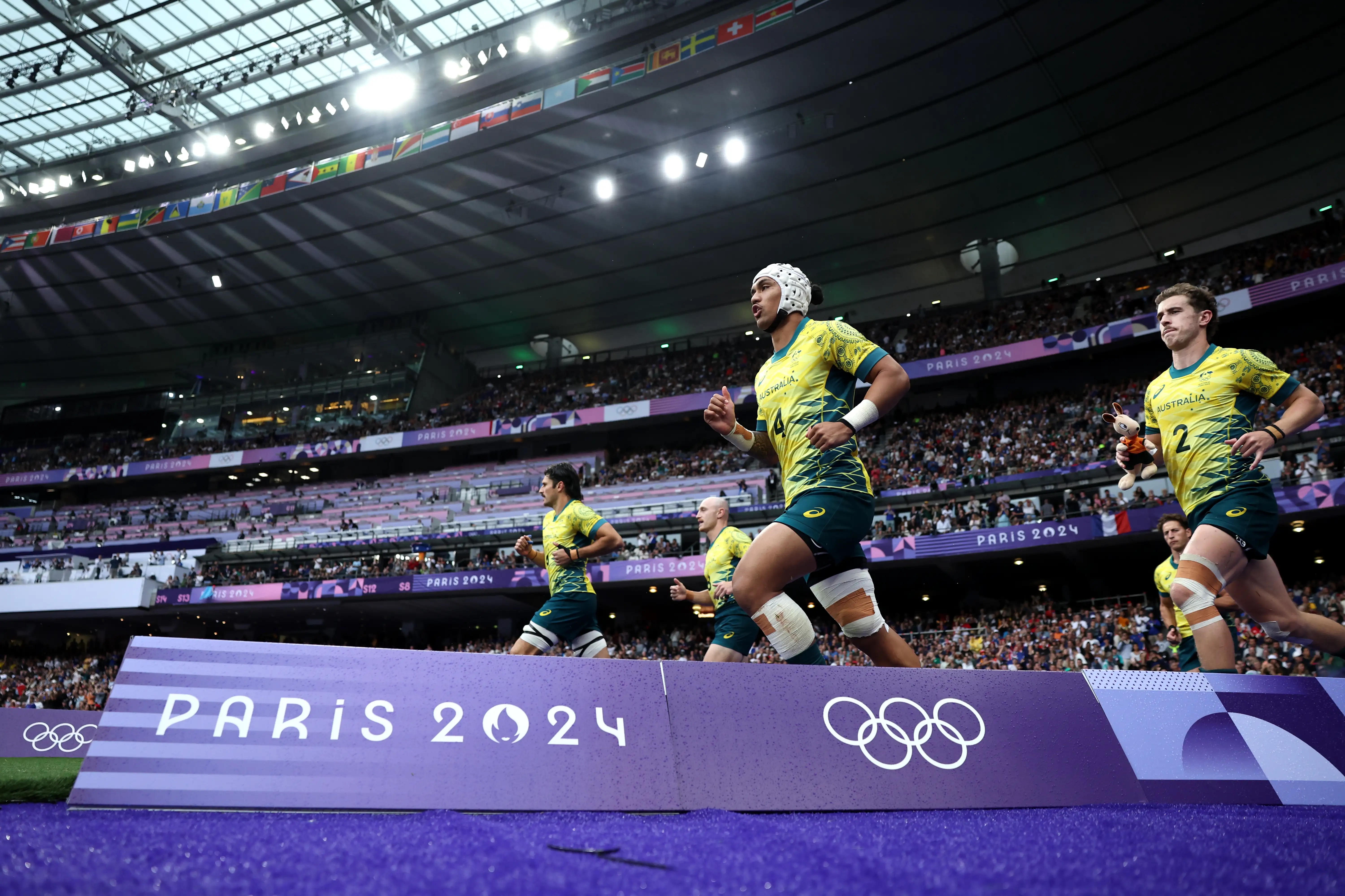 Corey Toole and Ben Dowling of Team Australia take to the field during the Men’s Rugby Sevens