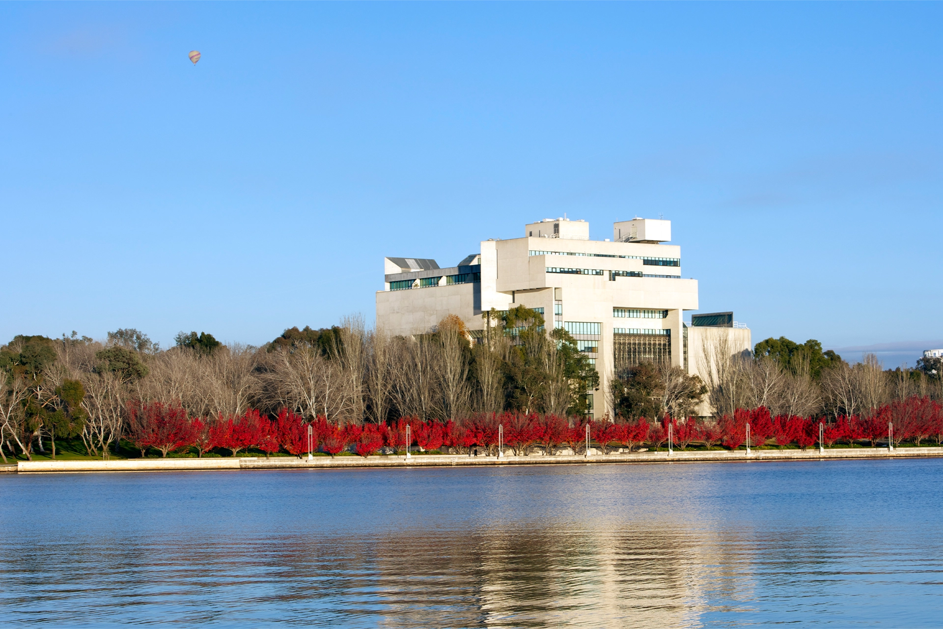 Australian High Court building viewed across lake