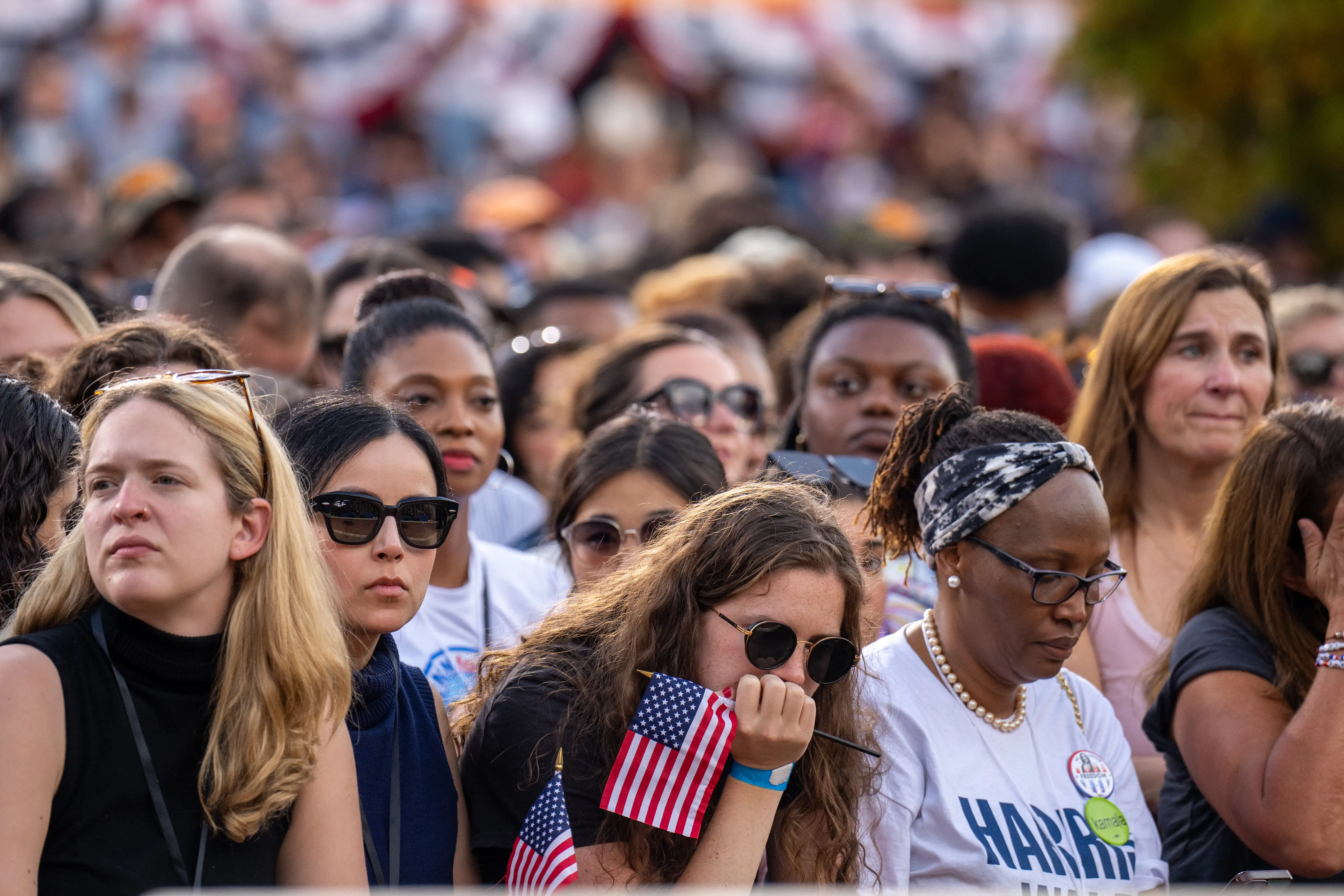 Supporters wait for Democratic presidential nominee, U.S. Vice President Kamala Harris to take the stage as she concedes the election