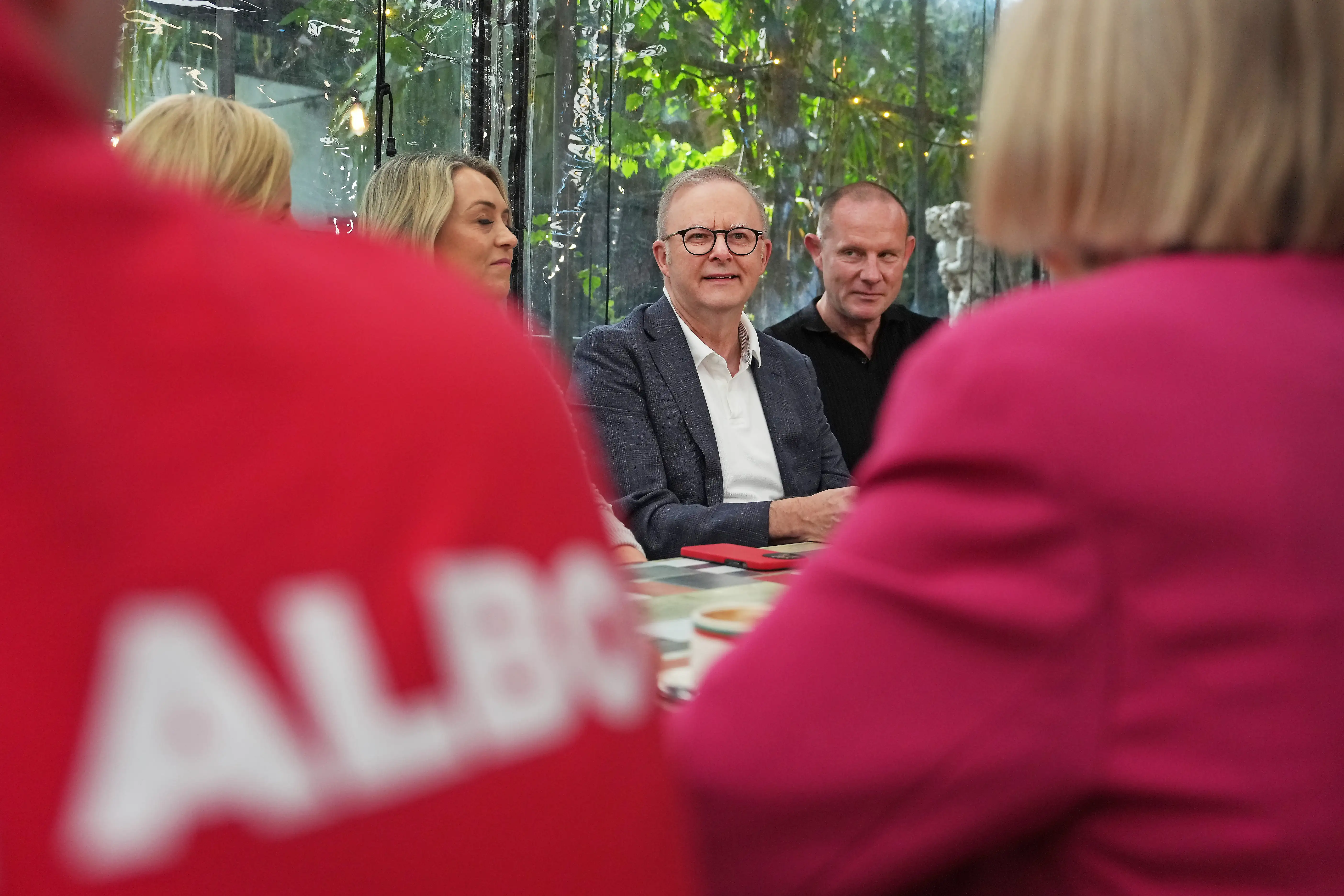 Australian Prime Minister Anthony Albanese visits a coffee shop in Sydney the day after the election
