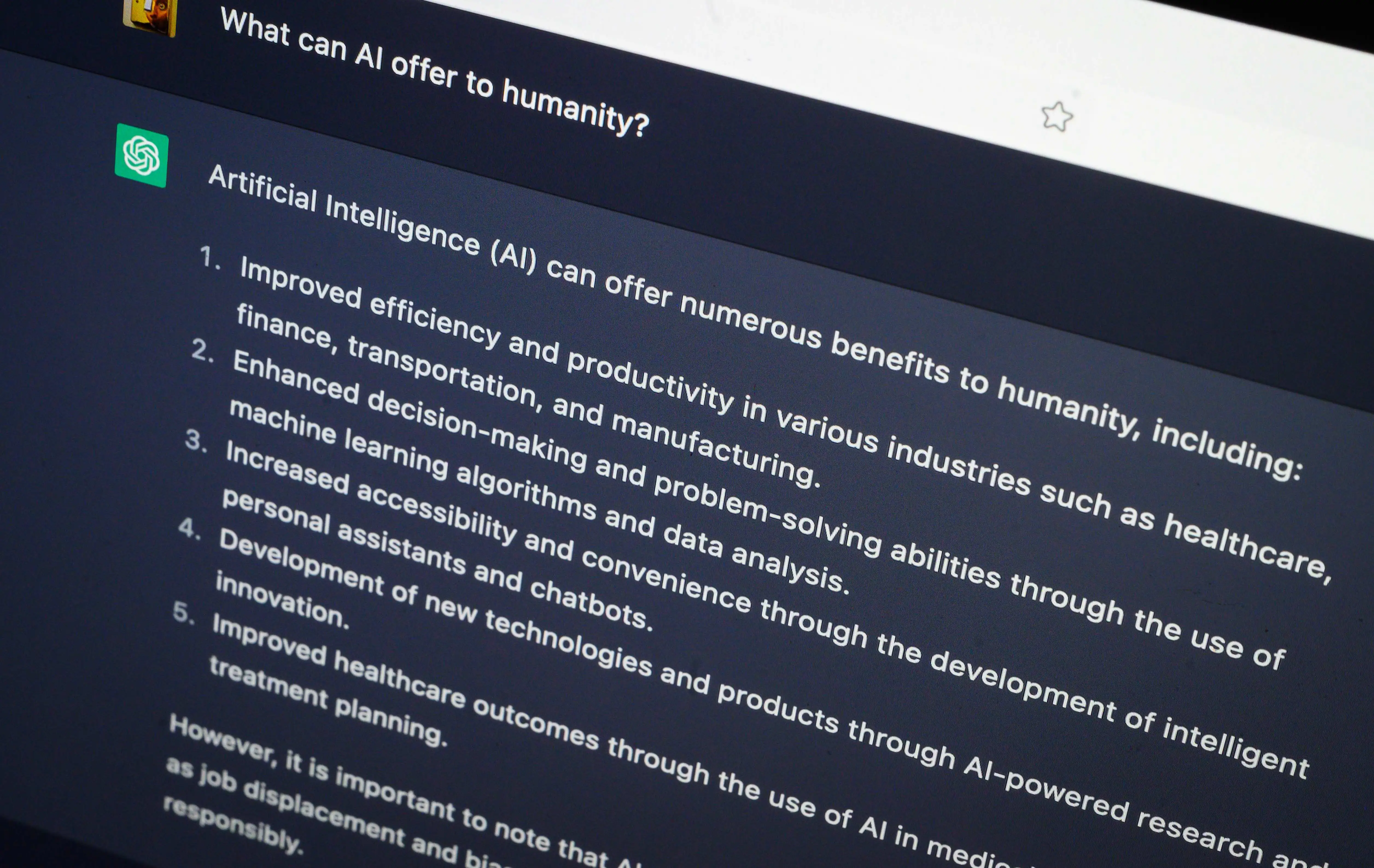 A laptop screen showing ChatGPT