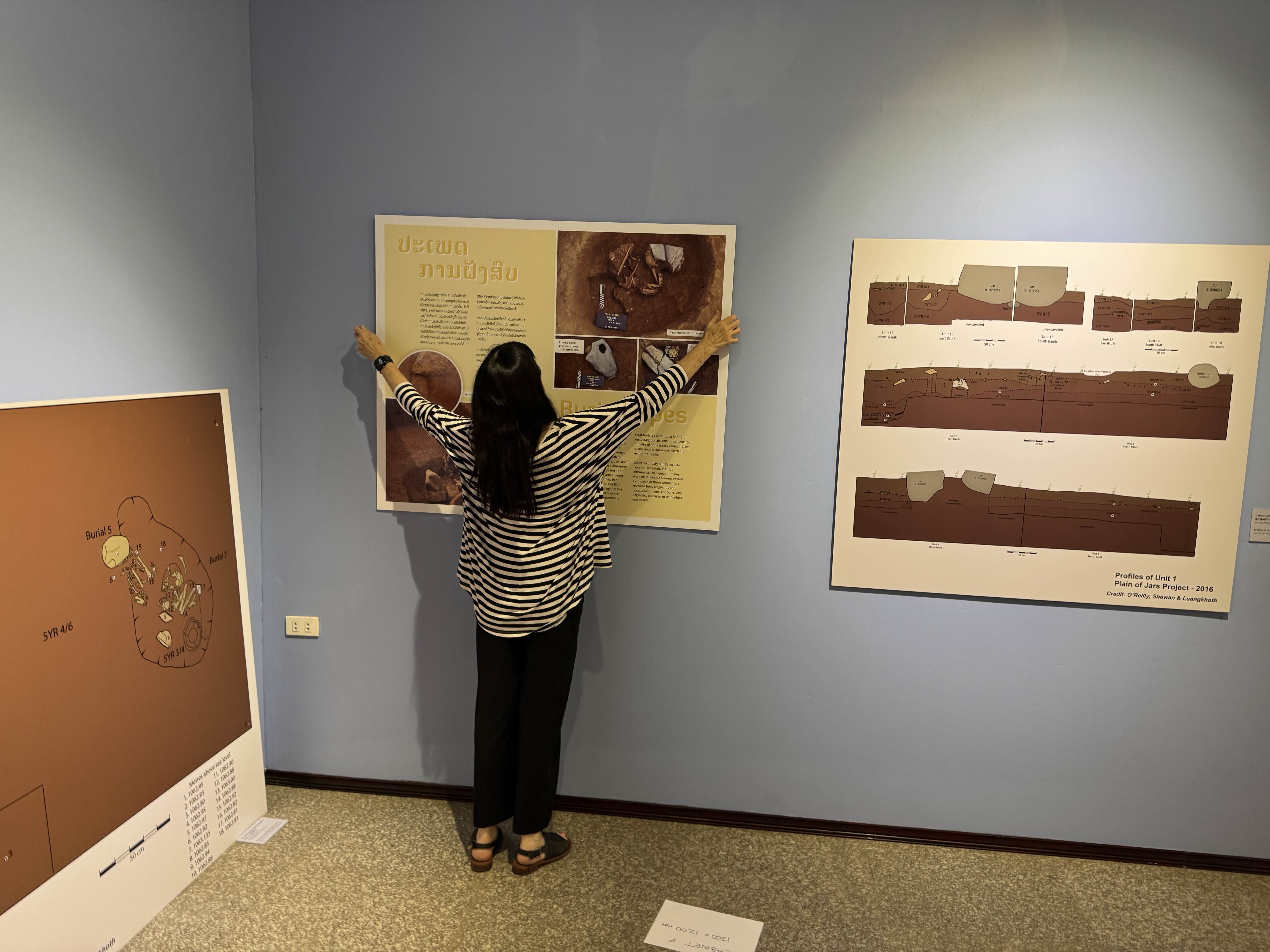 Hanging a poster in a museum