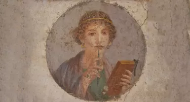 Fresco showing a woman so-called Sappho holding writing implements from Pompeii