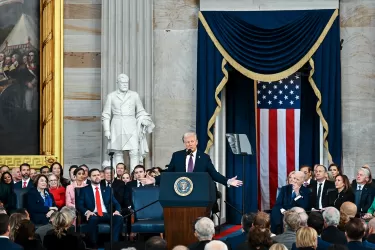 Donald Trump delivering speech at his 2025 inauguration in front of crowd