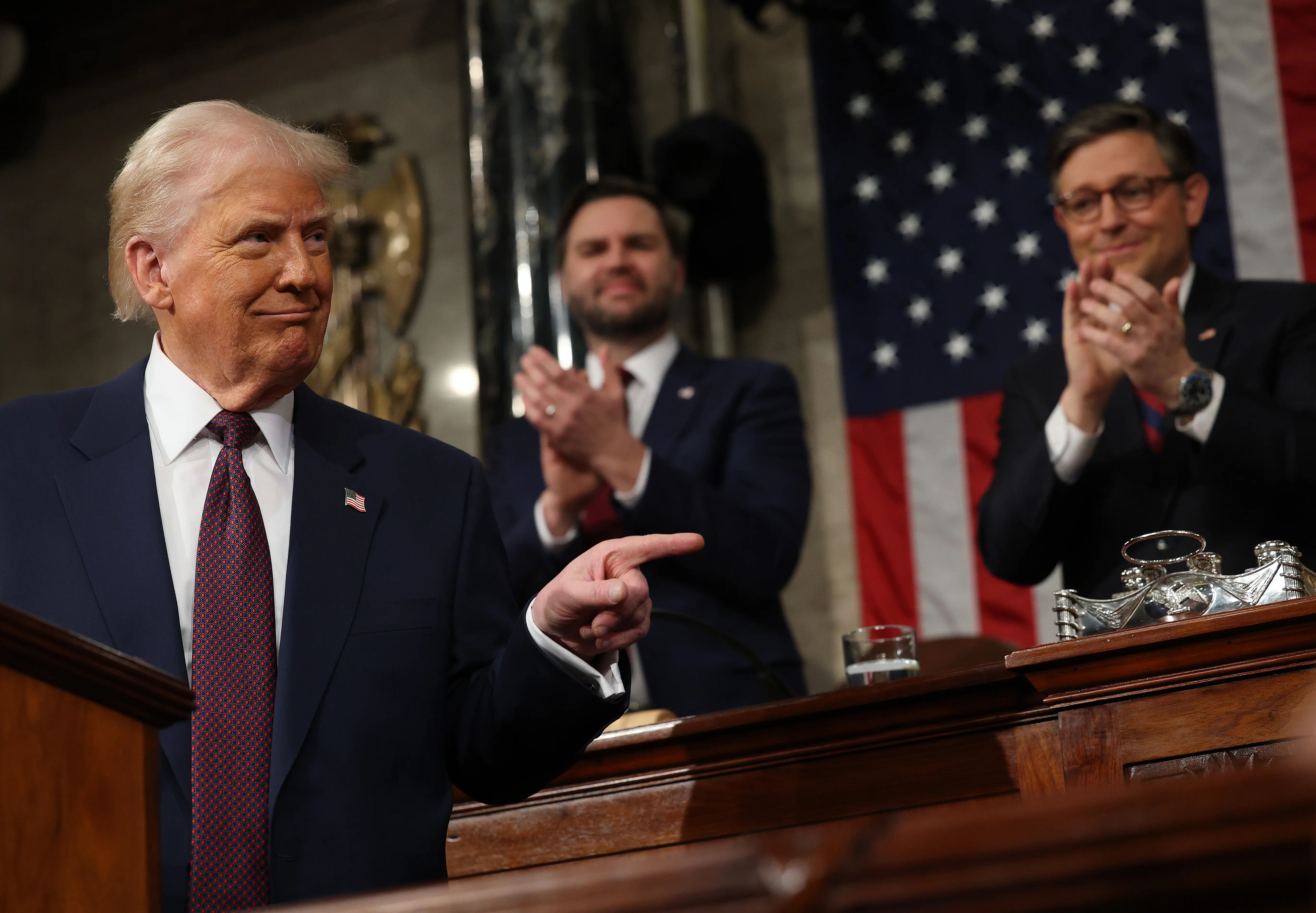  US Vice President JD Vance and Speaker of the House Mike Johnson applaud as US President Donald Trump