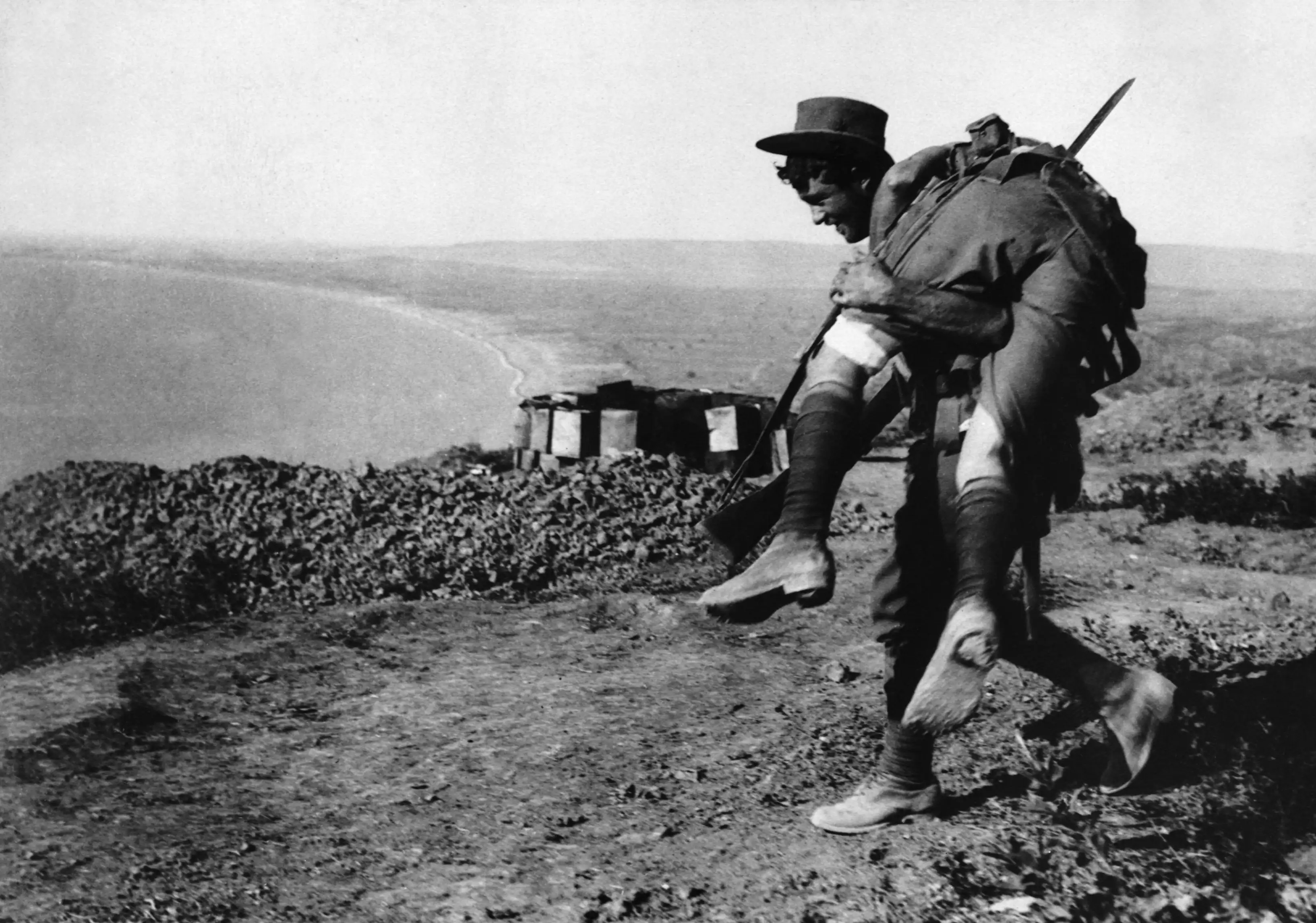 An Australian bringing in a wounded comrade to hospital on the Gallipoli Penninsula