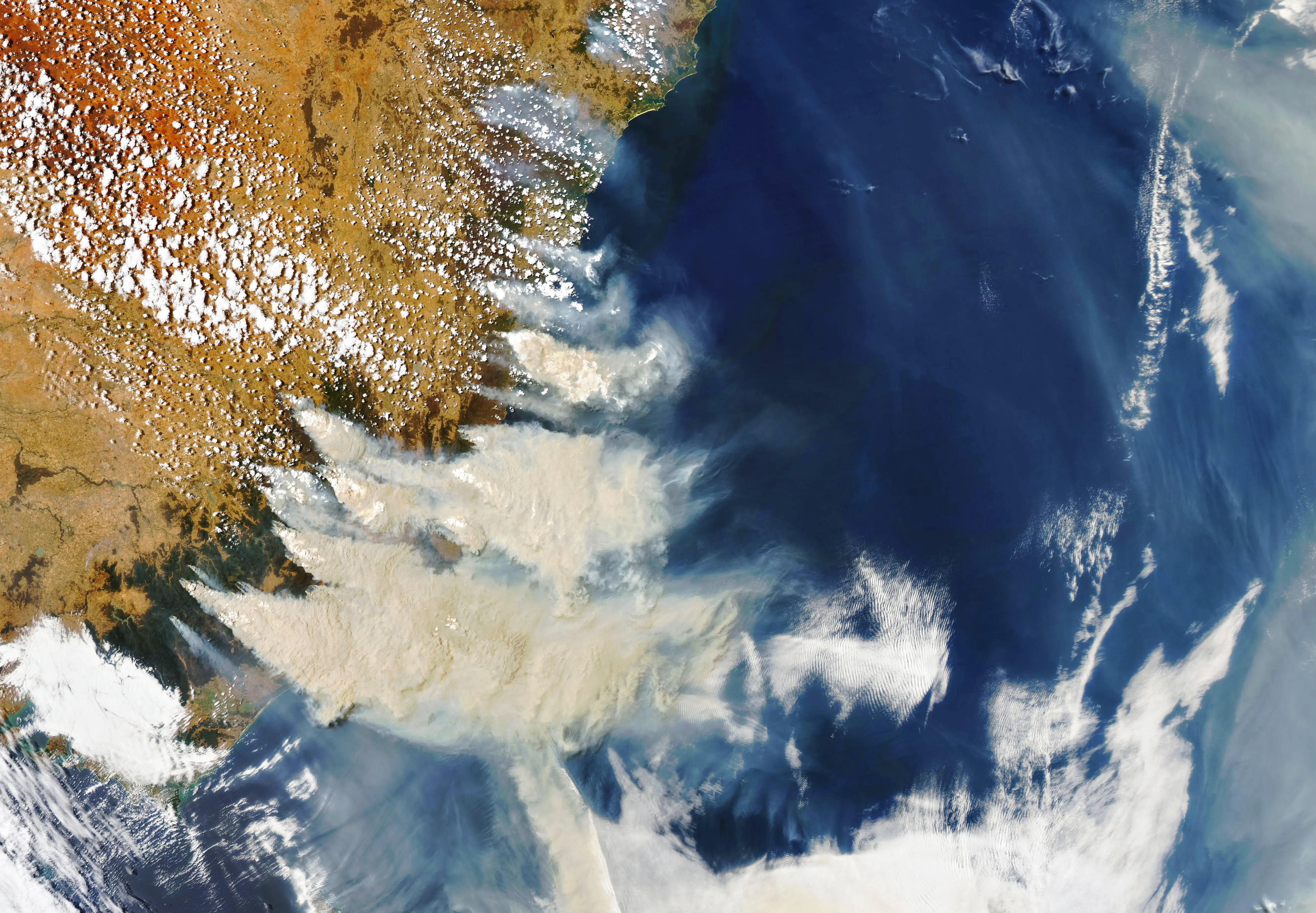 Smoke billows off Australia's east coast in the Black Summer fires