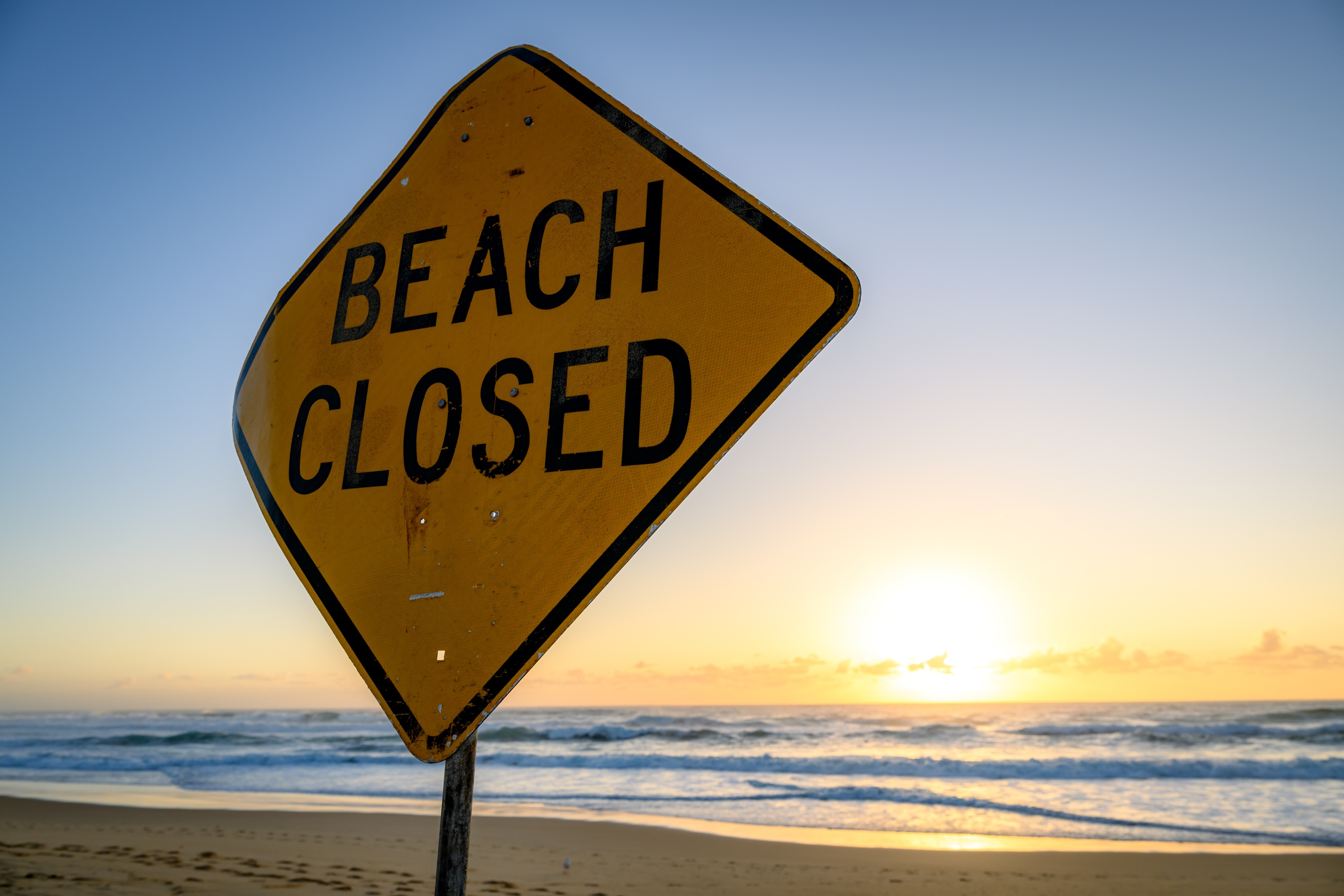 Beach closed sign