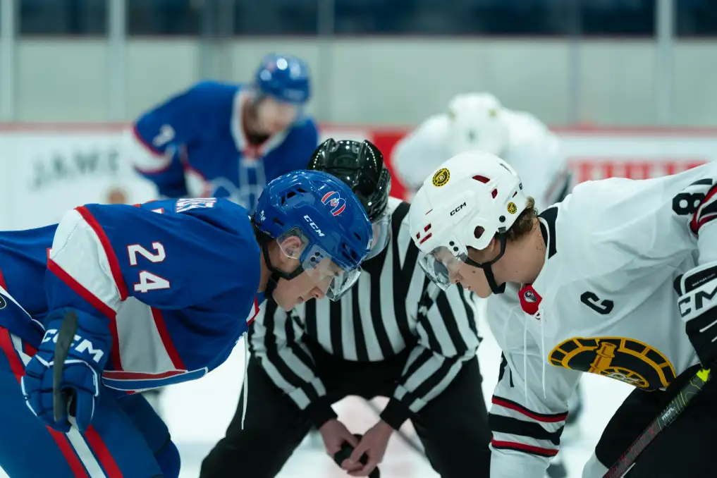A still from the TV series Heated Rivalry with the two main characters on the ice rink