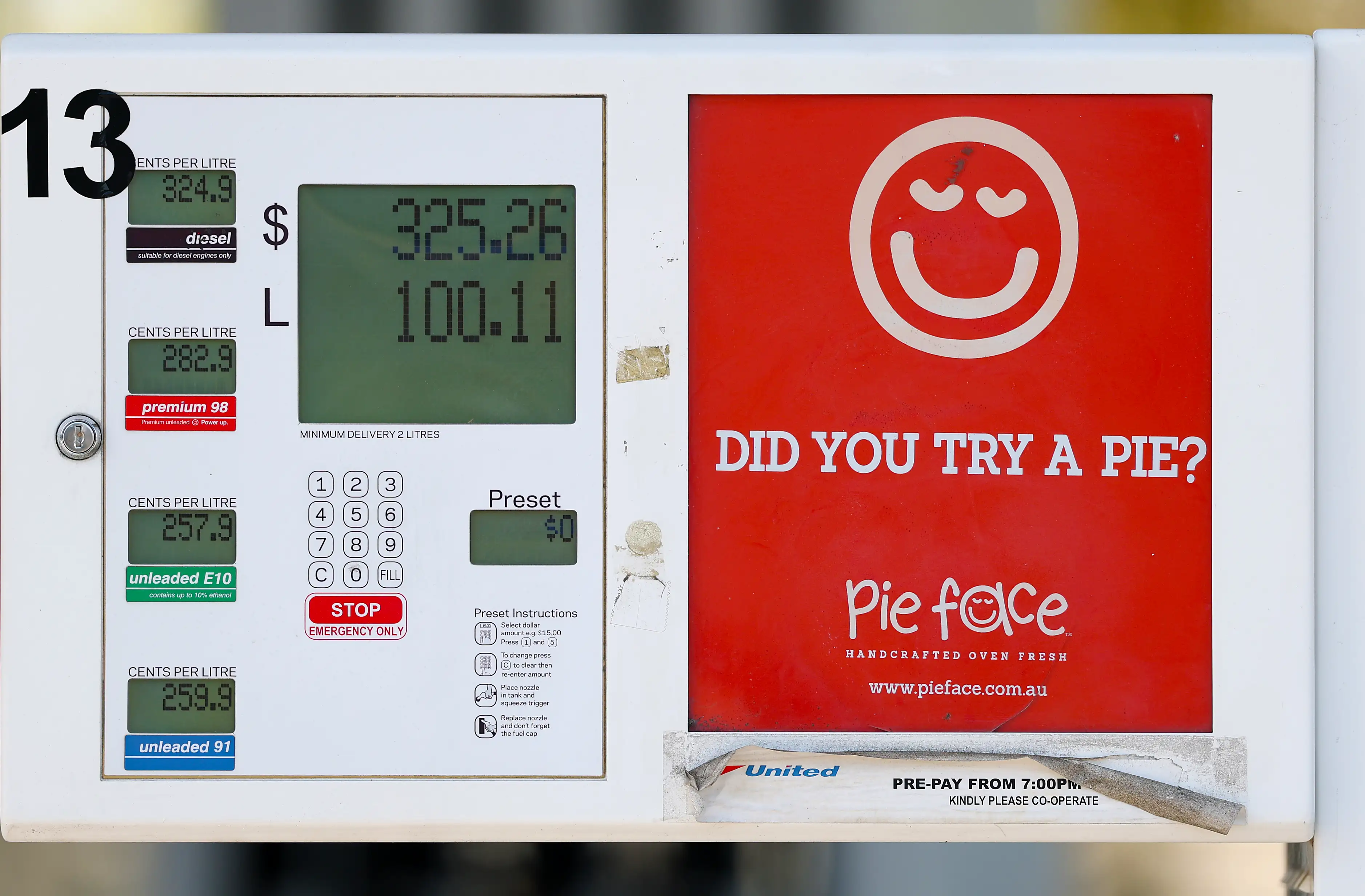 A pump showing 100 litres of petrol at a cost of $325.26 in Australia