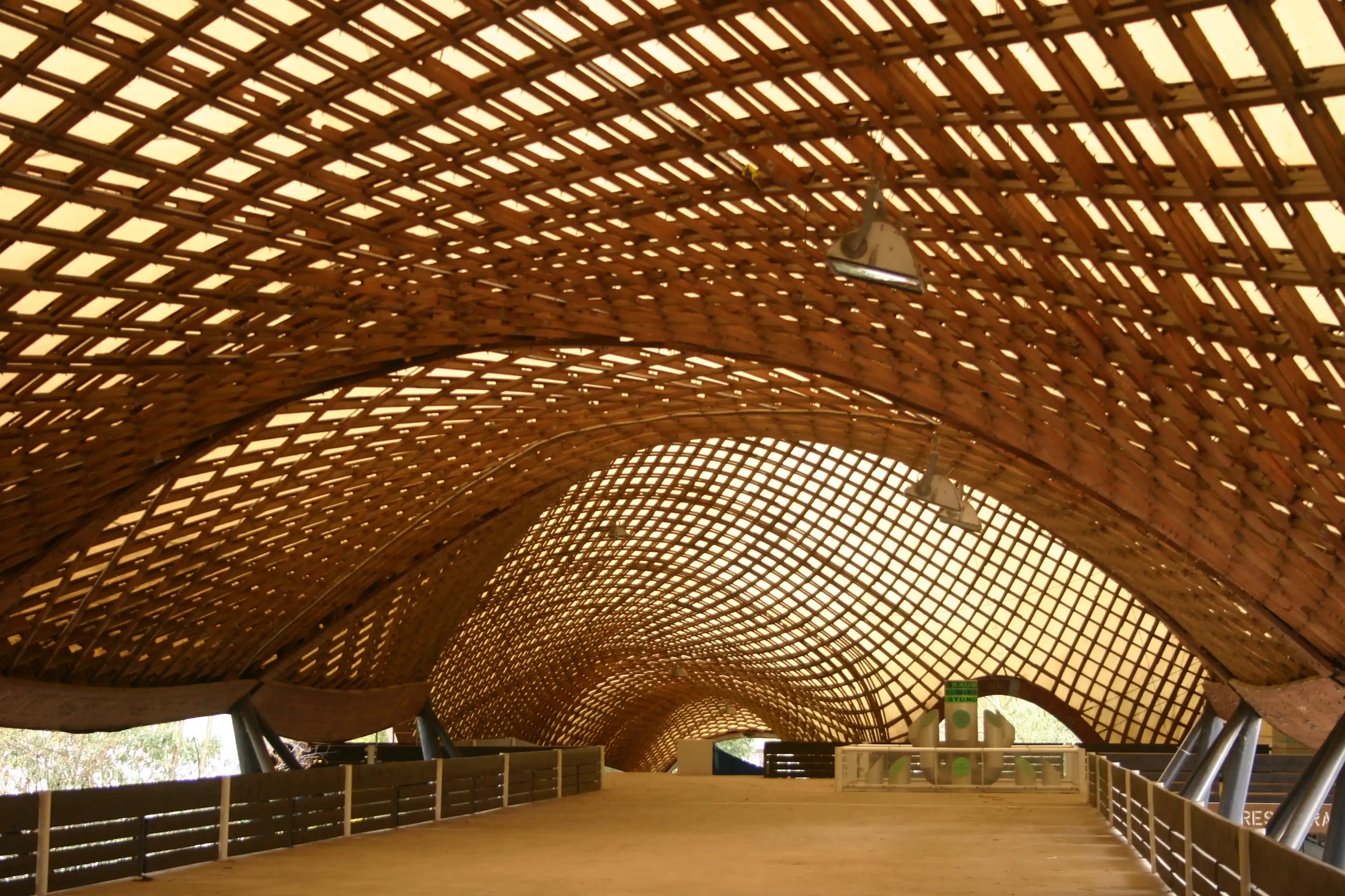 Inside of the Mannheim Multihalle with its curved timber gridshell