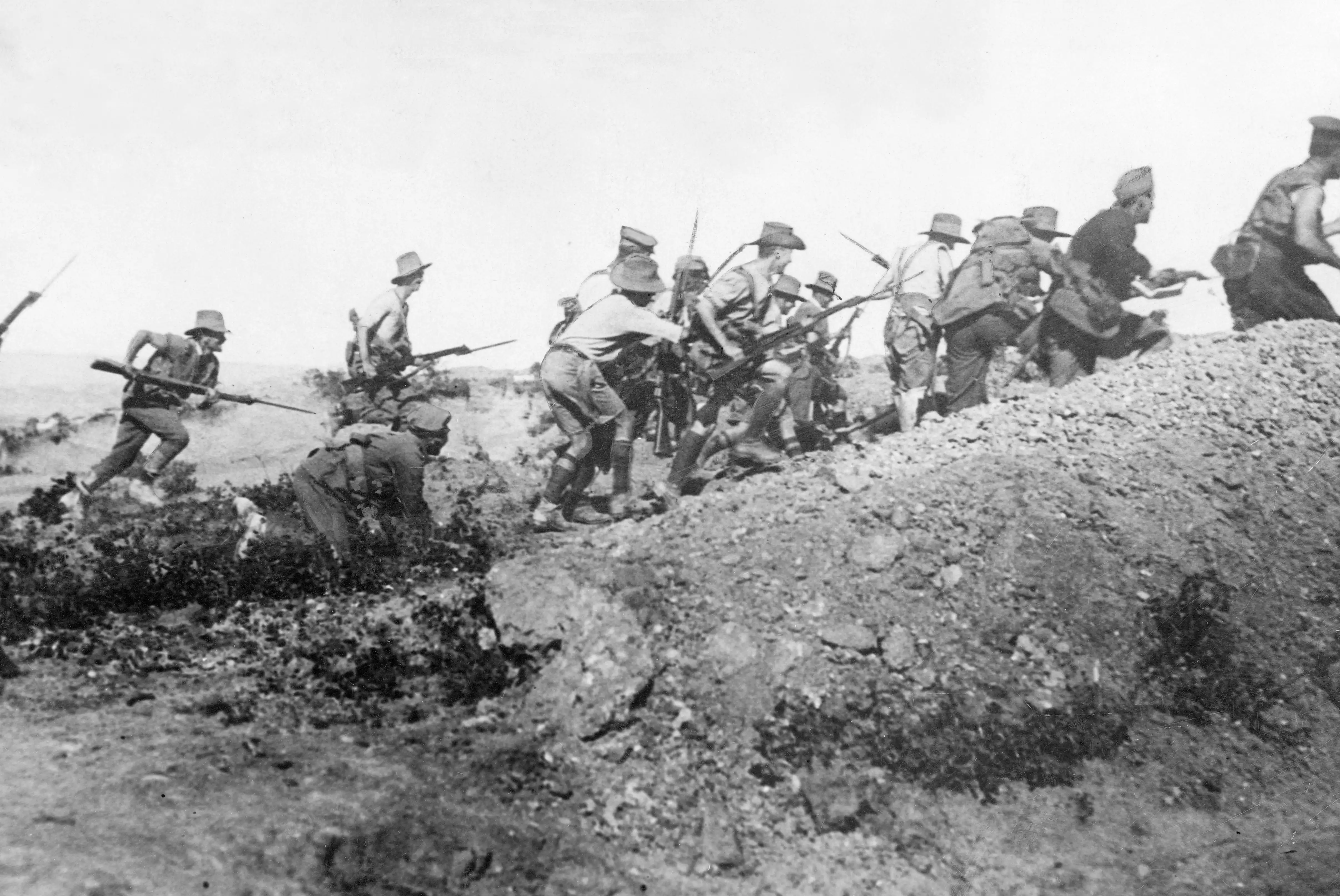 Australian troops charge near a Turkish trench just before the evacuation at Anzac.