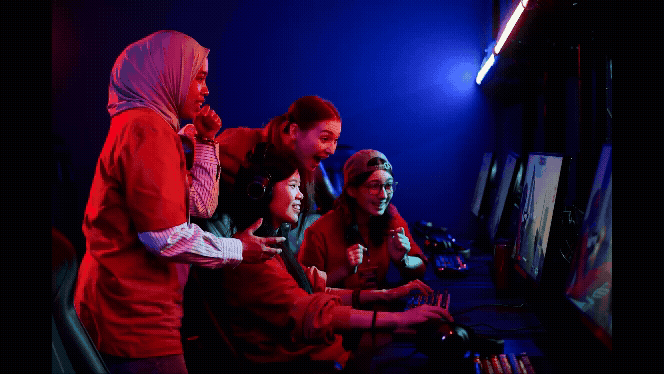 A diverse group of your esports players watching a game