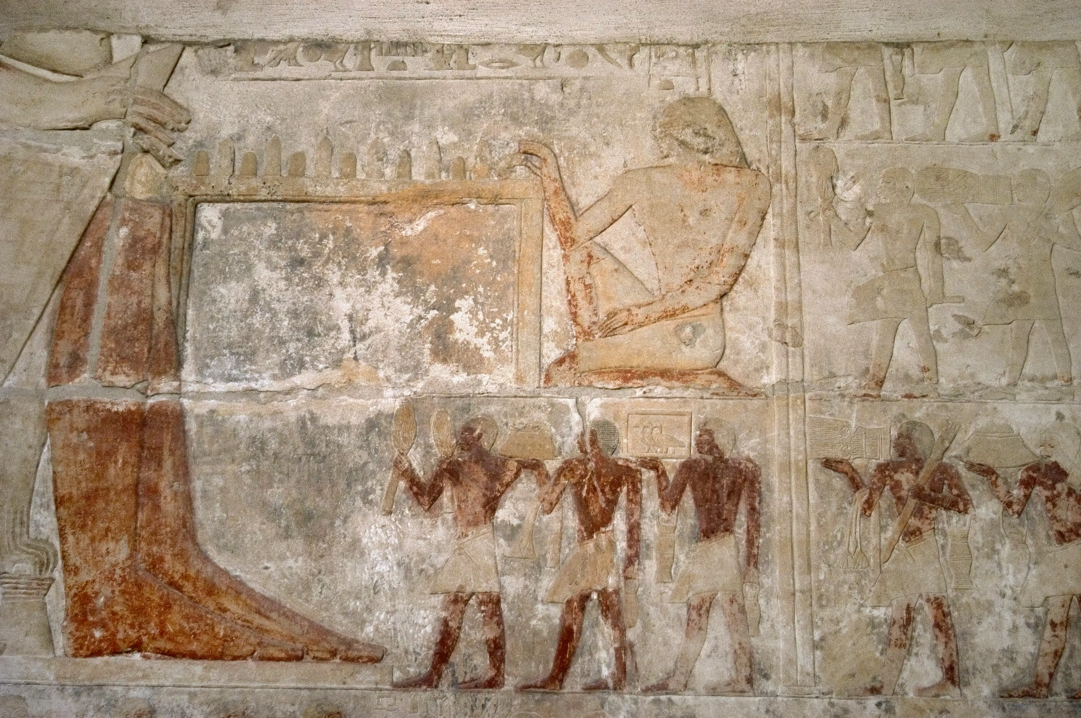 A tablet depicting Pharaoh Teti with his wife, Watetkhethor, seated and playing a game of senet.