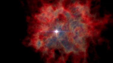 A red cloud surrounds the remnants of a dying star in space