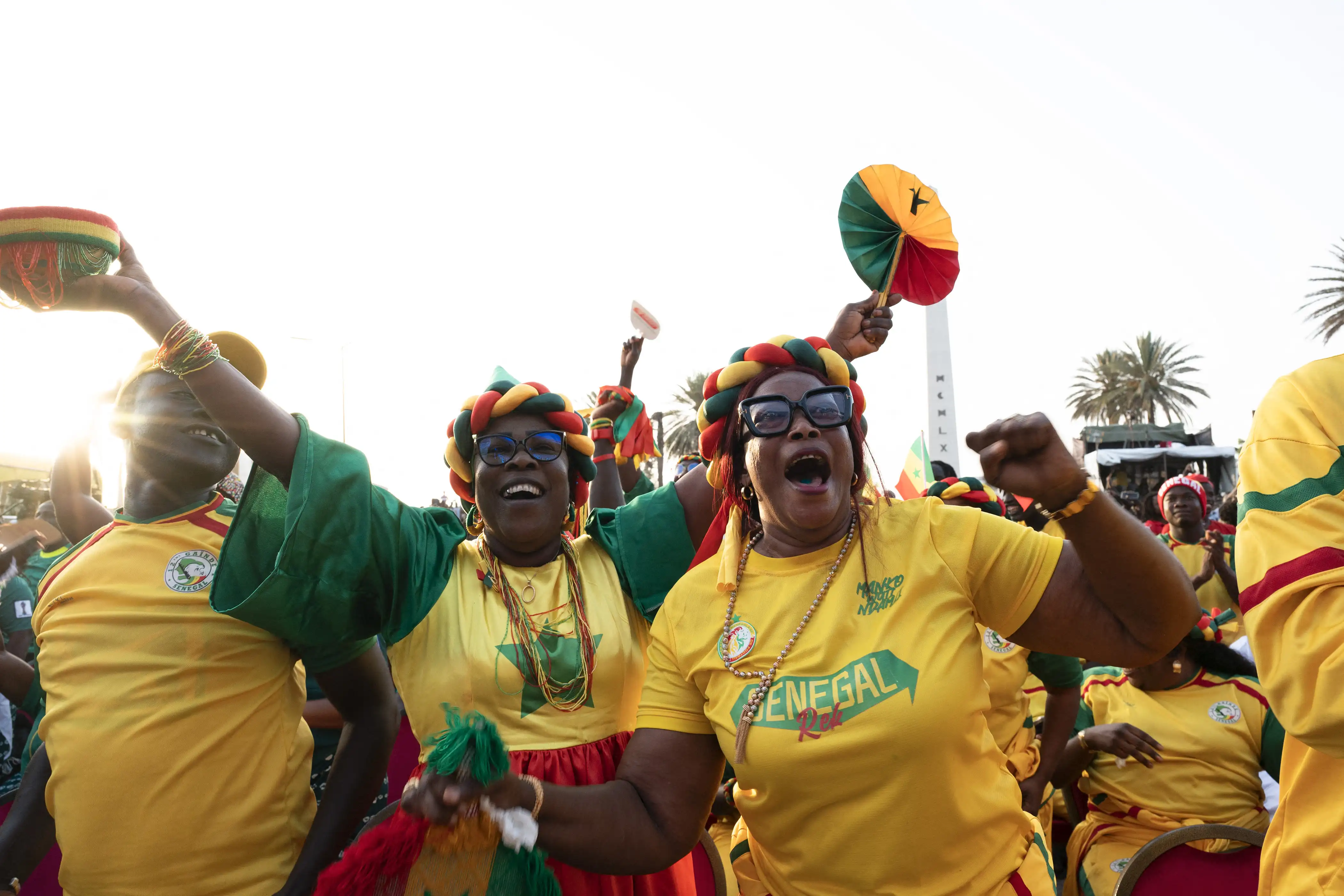 Senegal supporters celebrate the team’s win against Iraq