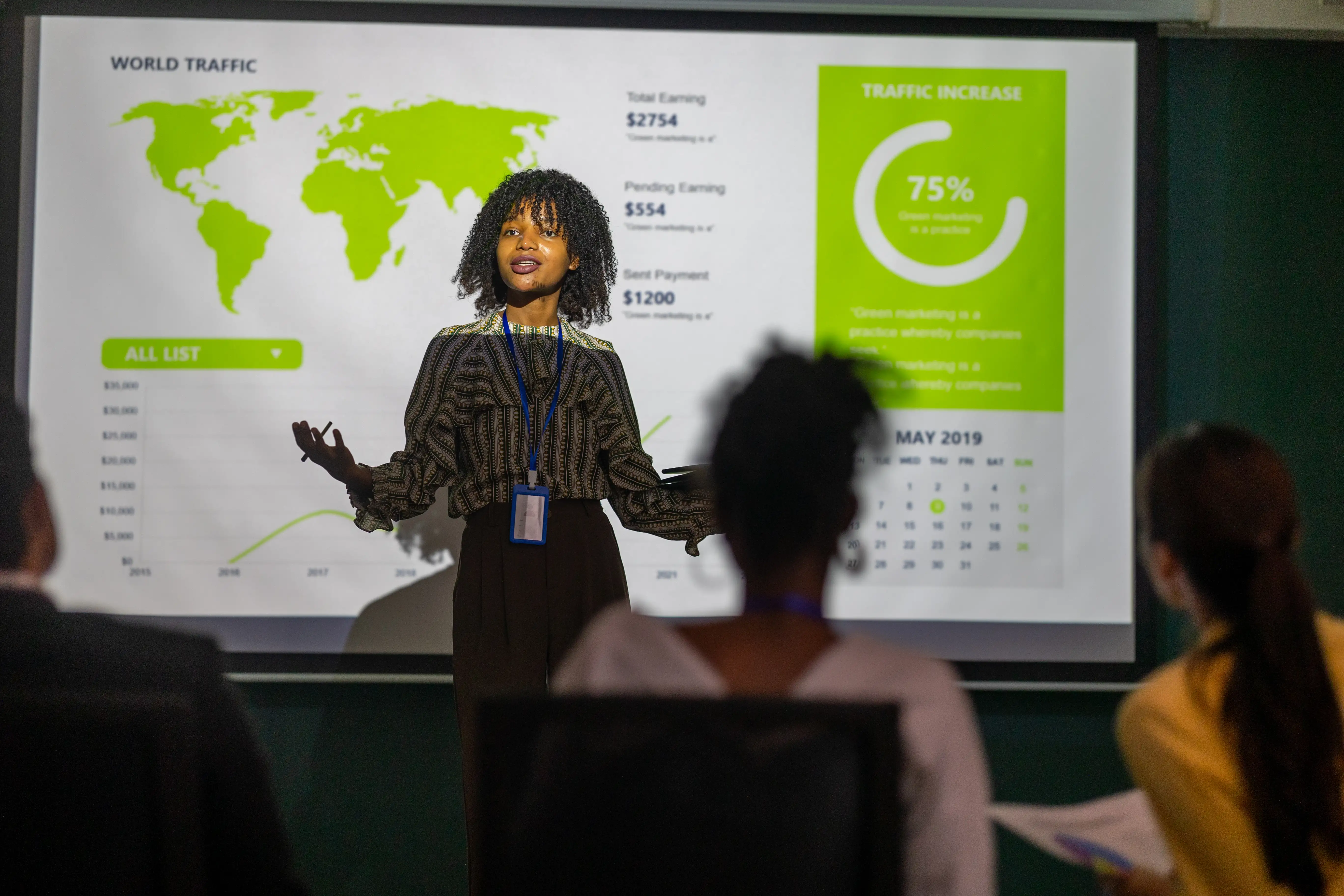 Young black woman presenting to an audience