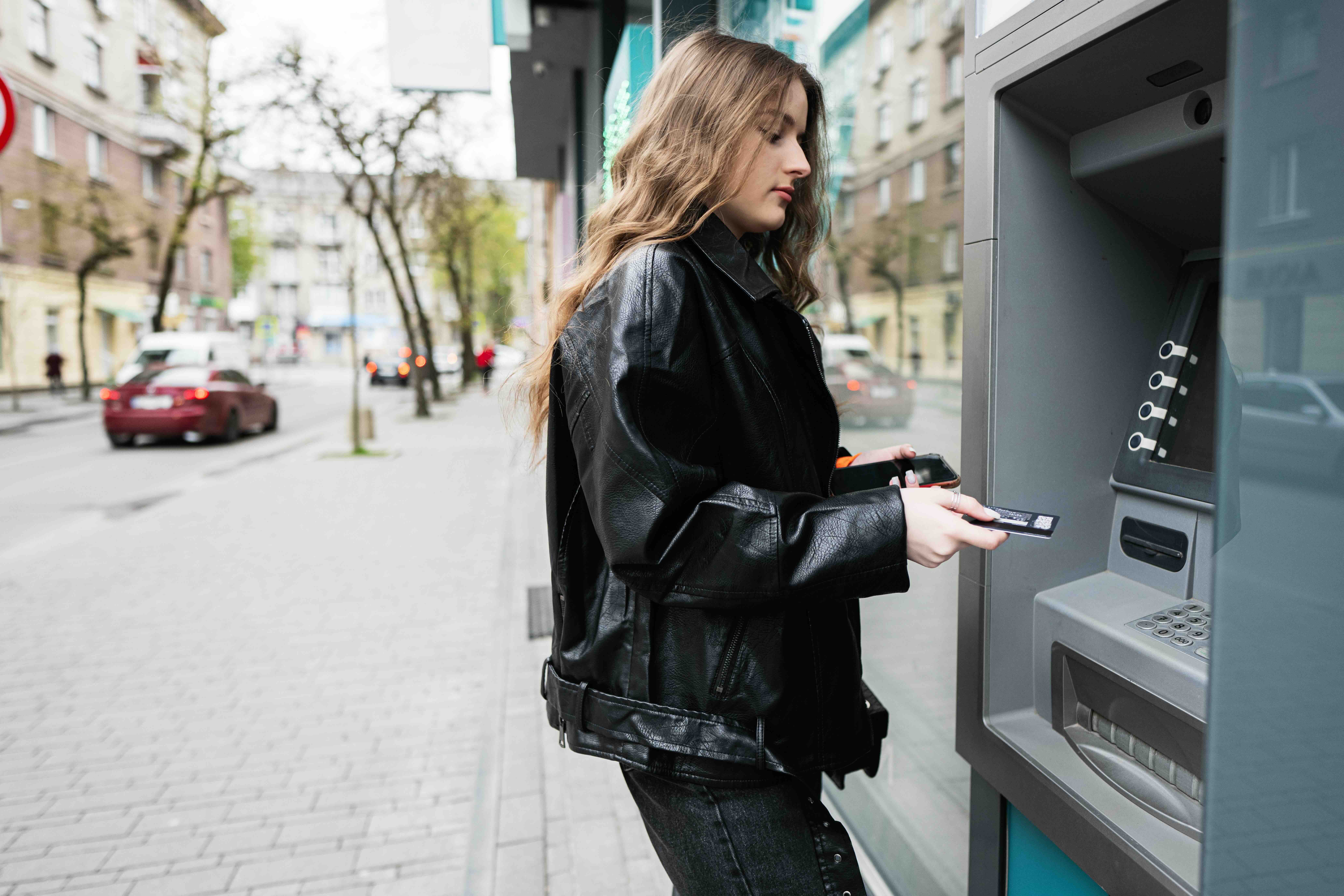 Young Woman at ATM