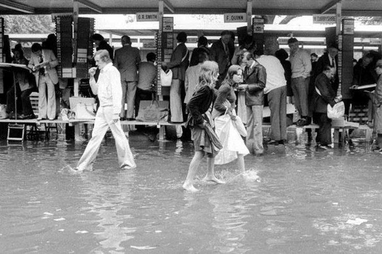 Revellers at a flooded Melbourne Cup 1976