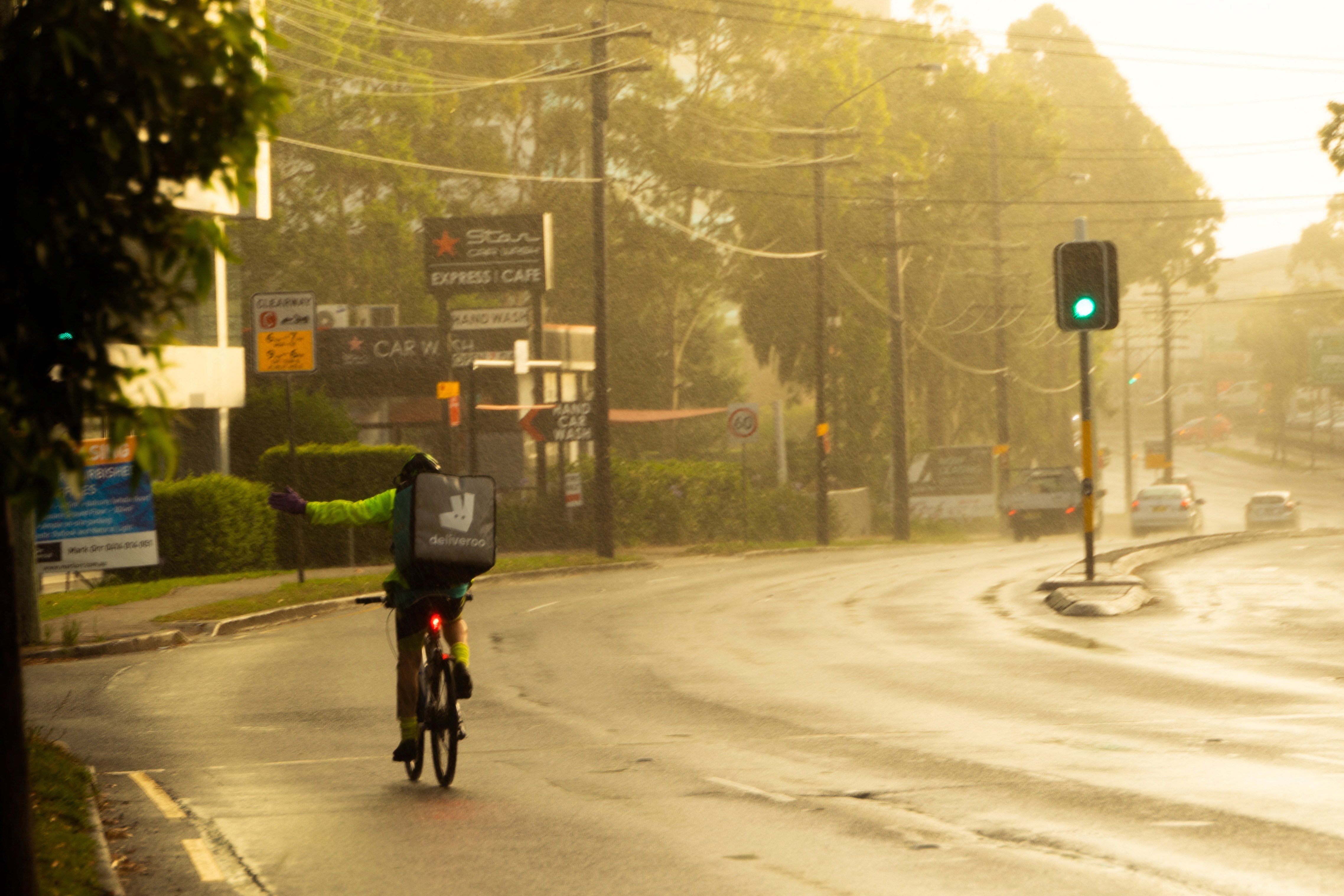 Deliveroo driver in rain